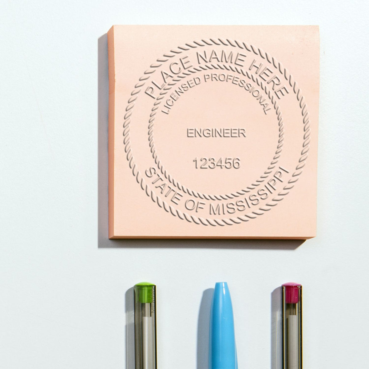 An in use photo of the Gift Mississippi Engineer Seal showing a sample imprint on a cardstock