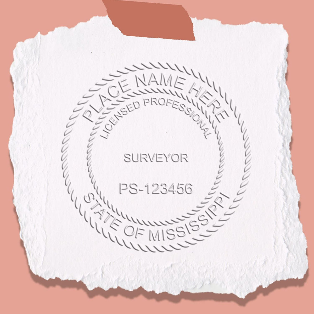 An in use photo of the Hybrid Mississippi Land Surveyor Seal showing a sample imprint on a cardstock