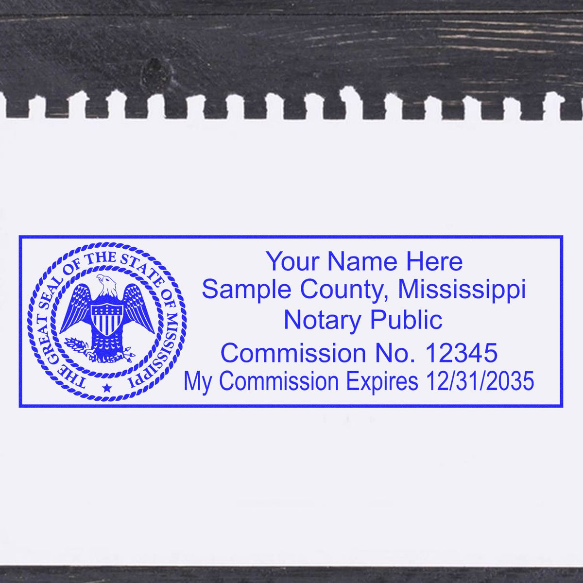 A photograph of the Heavy-Duty Mississippi Rectangular Notary Stamp stamp impression reveals a vivid, professional image of the on paper.