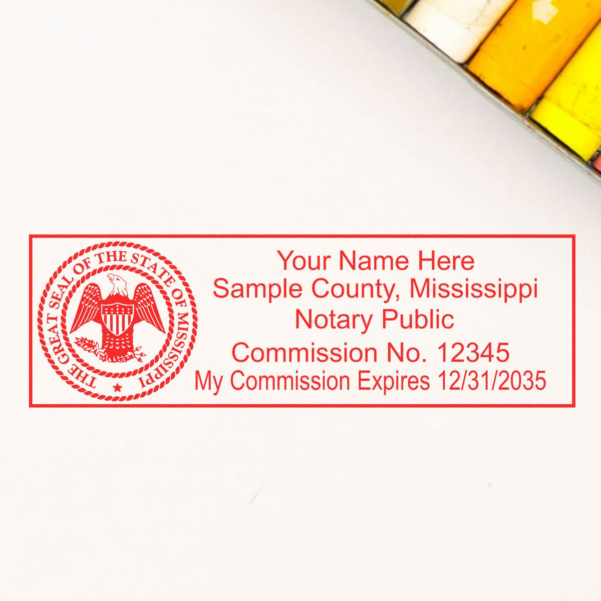 An alternative view of the Slim Pre-Inked State Seal Notary Stamp for Mississippi stamped on a sheet of paper showing the image in use