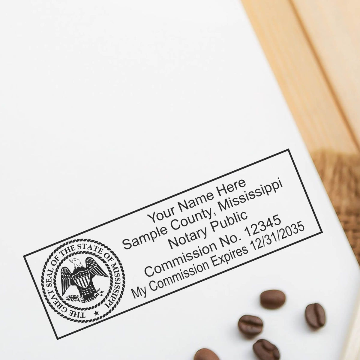 A lifestyle photo showing a stamped image of the Heavy-Duty Mississippi Rectangular Notary Stamp on a piece of paper