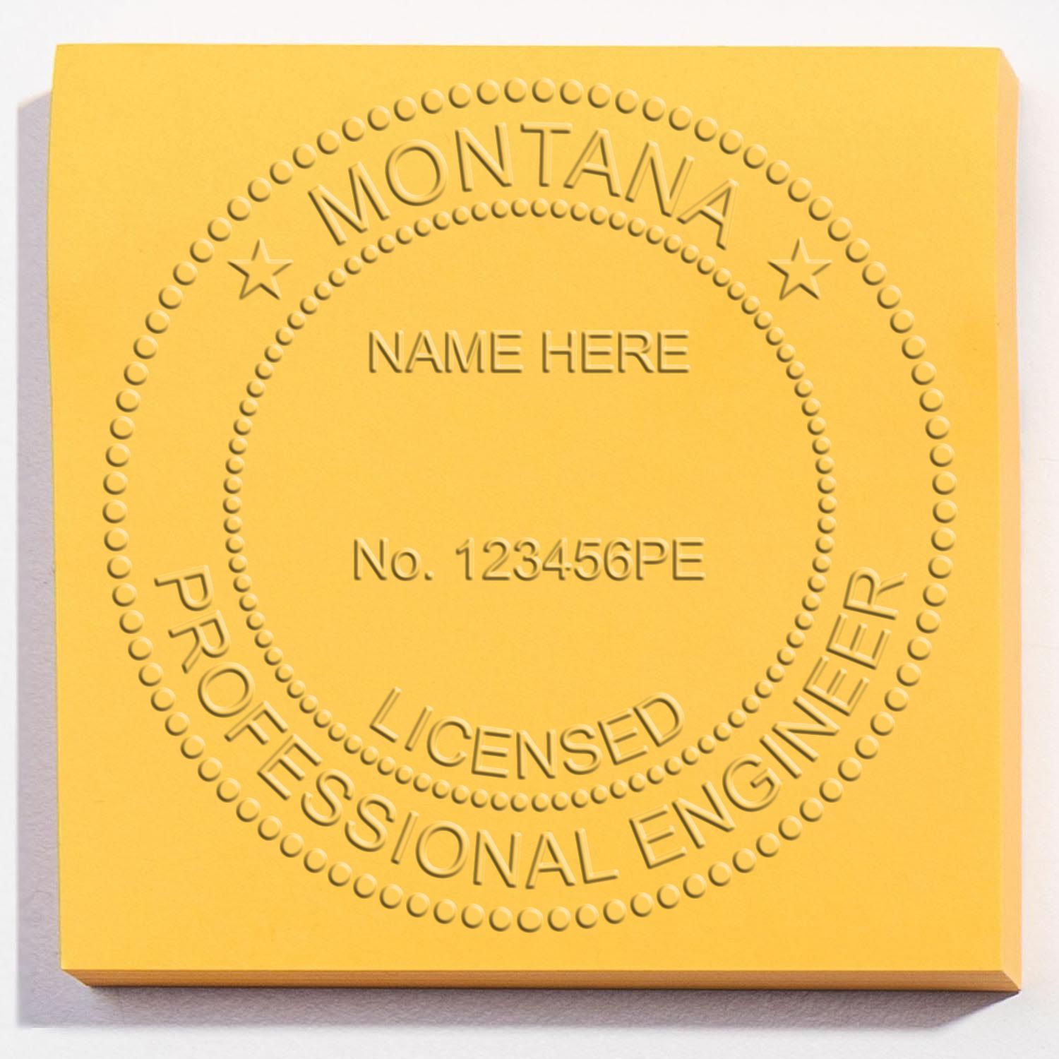 The main image for the Handheld Montana Professional Engineer Embosser depicting a sample of the imprint and electronic files