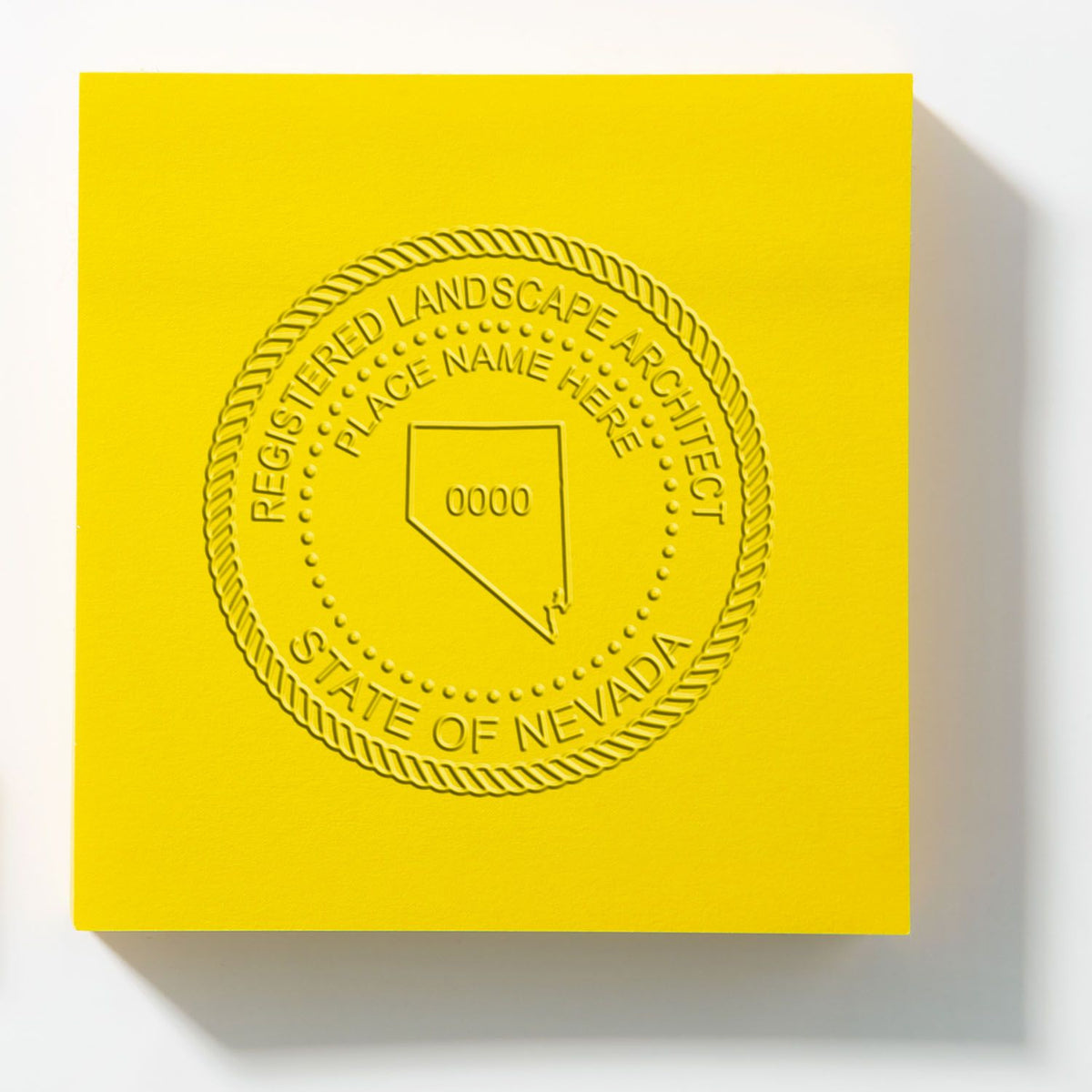 An alternative view of the Gift Nevada Landscape Architect Seal stamped on a sheet of paper showing the image in use