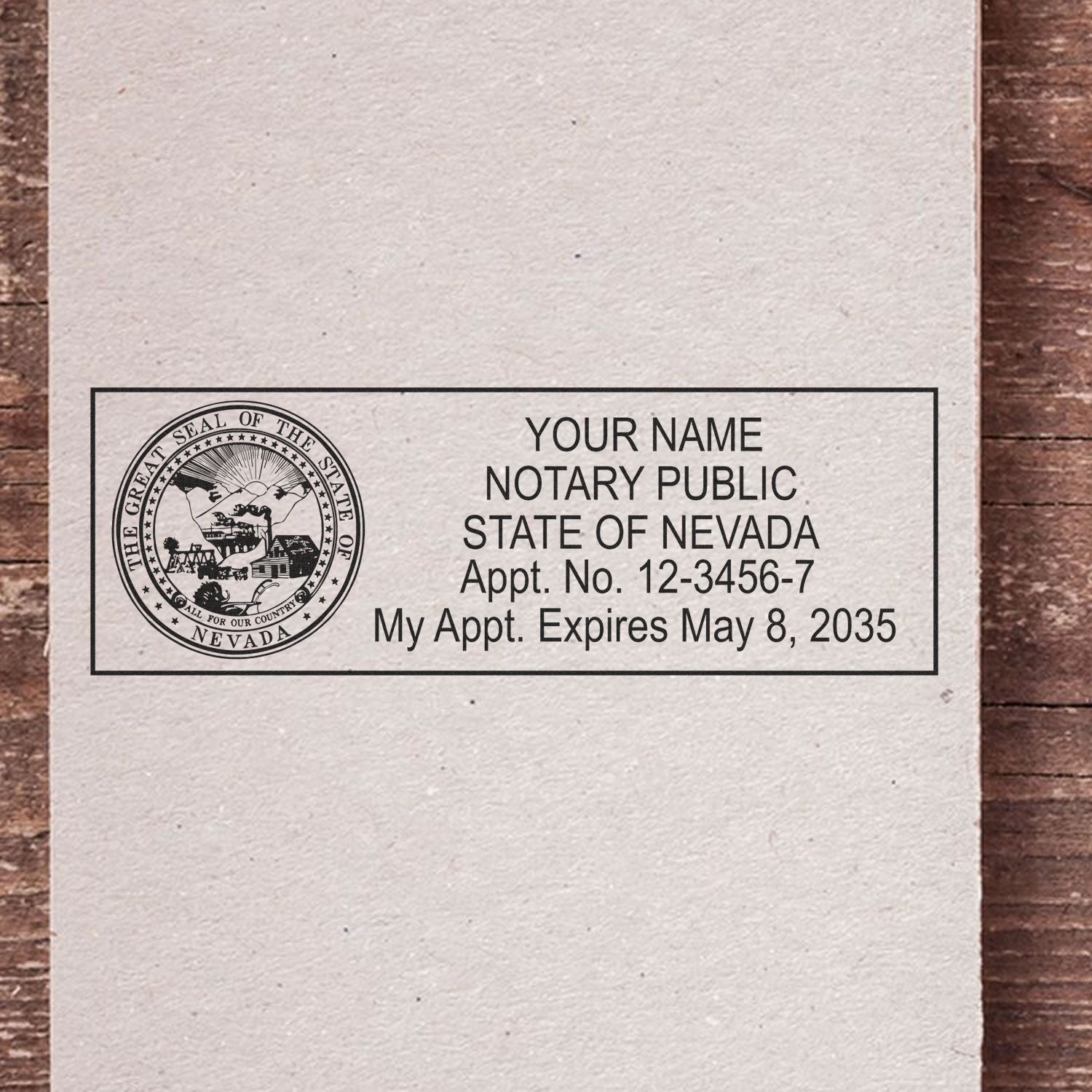 The main image for the Heavy-Duty Nevada Rectangular Notary Stamp depicting a sample of the imprint and electronic files