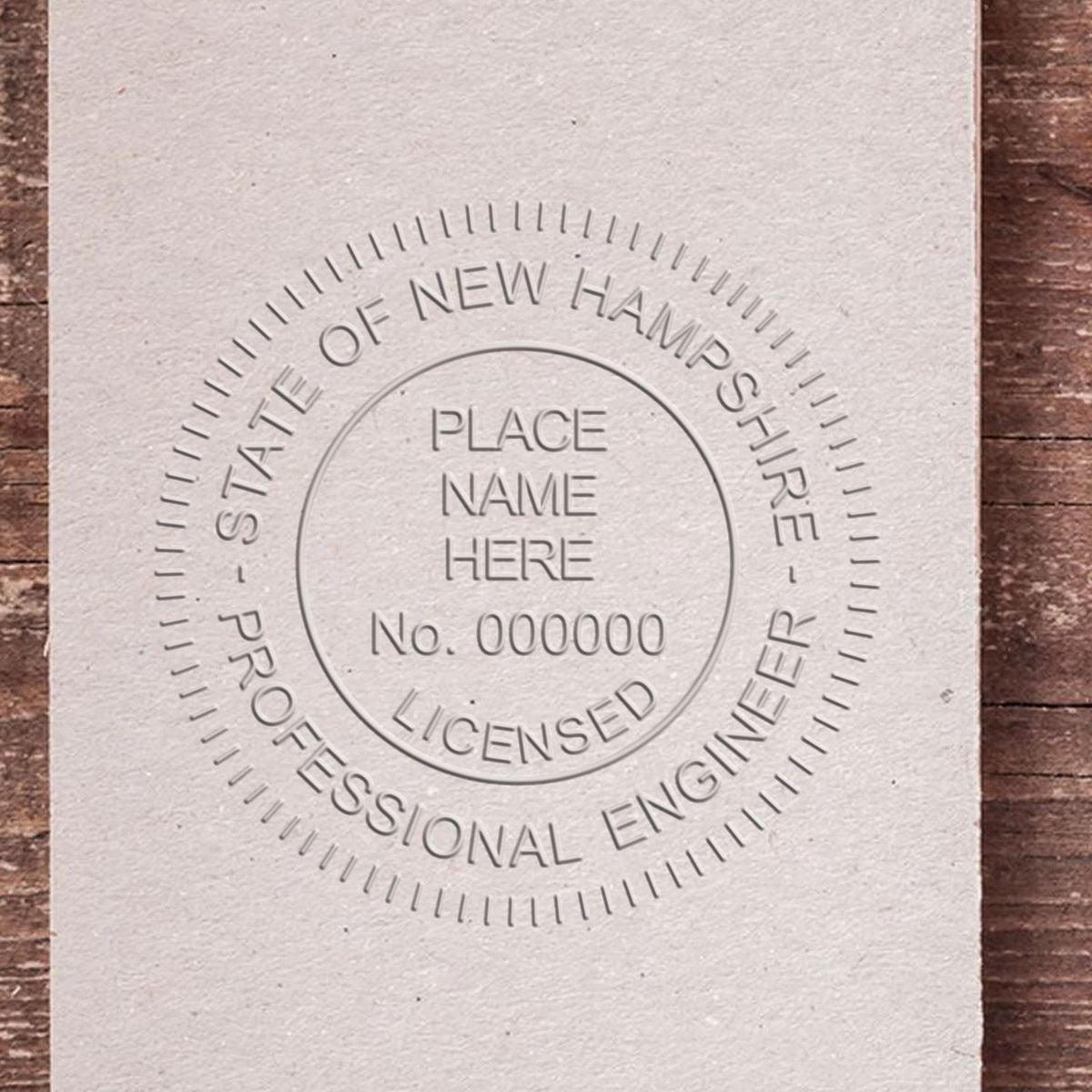 A photograph of the Hybrid New Hampshire Engineer Seal stamp impression reveals a vivid, professional image of the on paper.