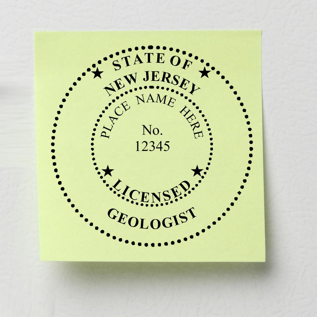 A lifestyle photo showing a stamped image of the Self-Inking New Jersey Geologist Stamp on a piece of paper