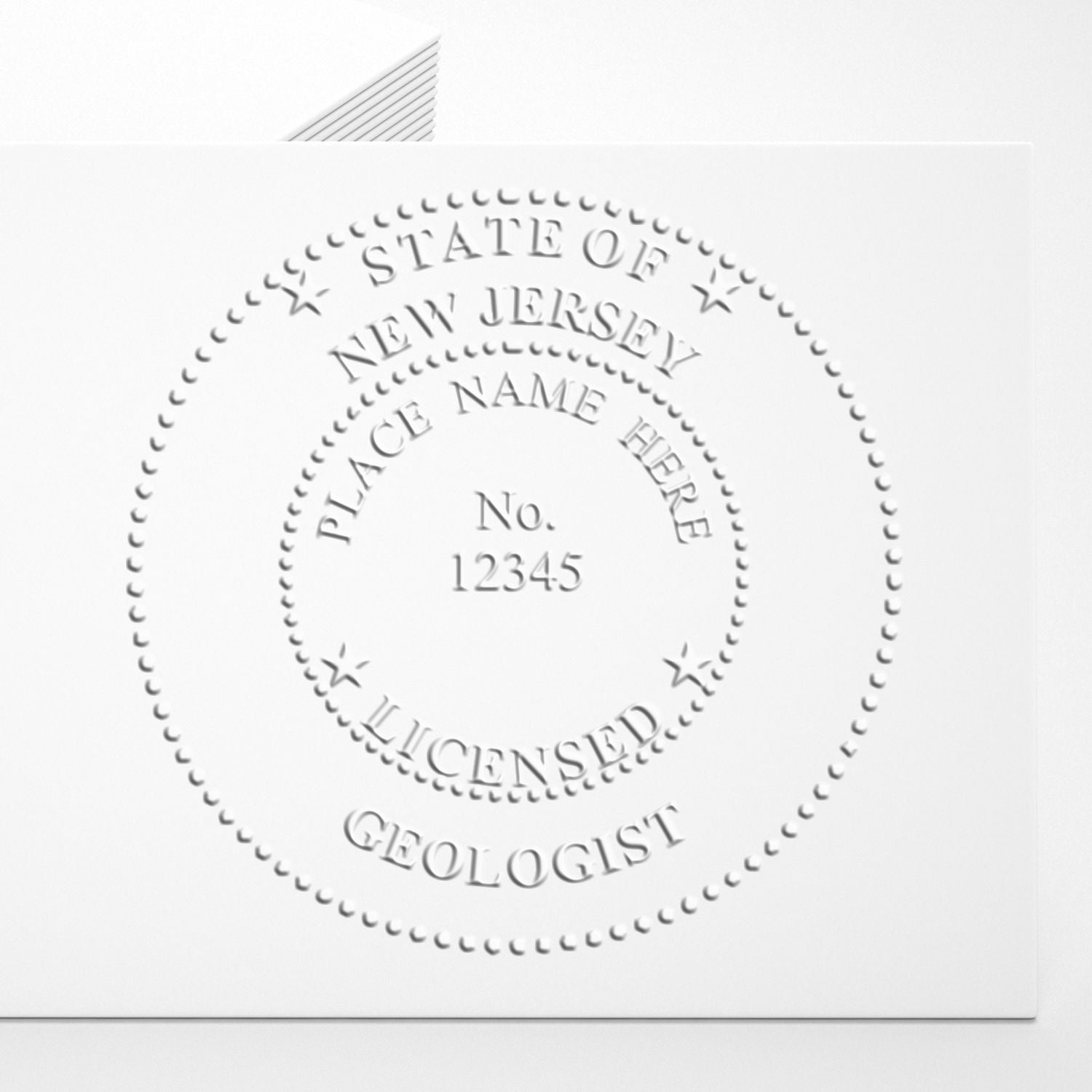 An in use photo of the Soft New Jersey Professional Geologist Seal showing a sample imprint on a cardstock