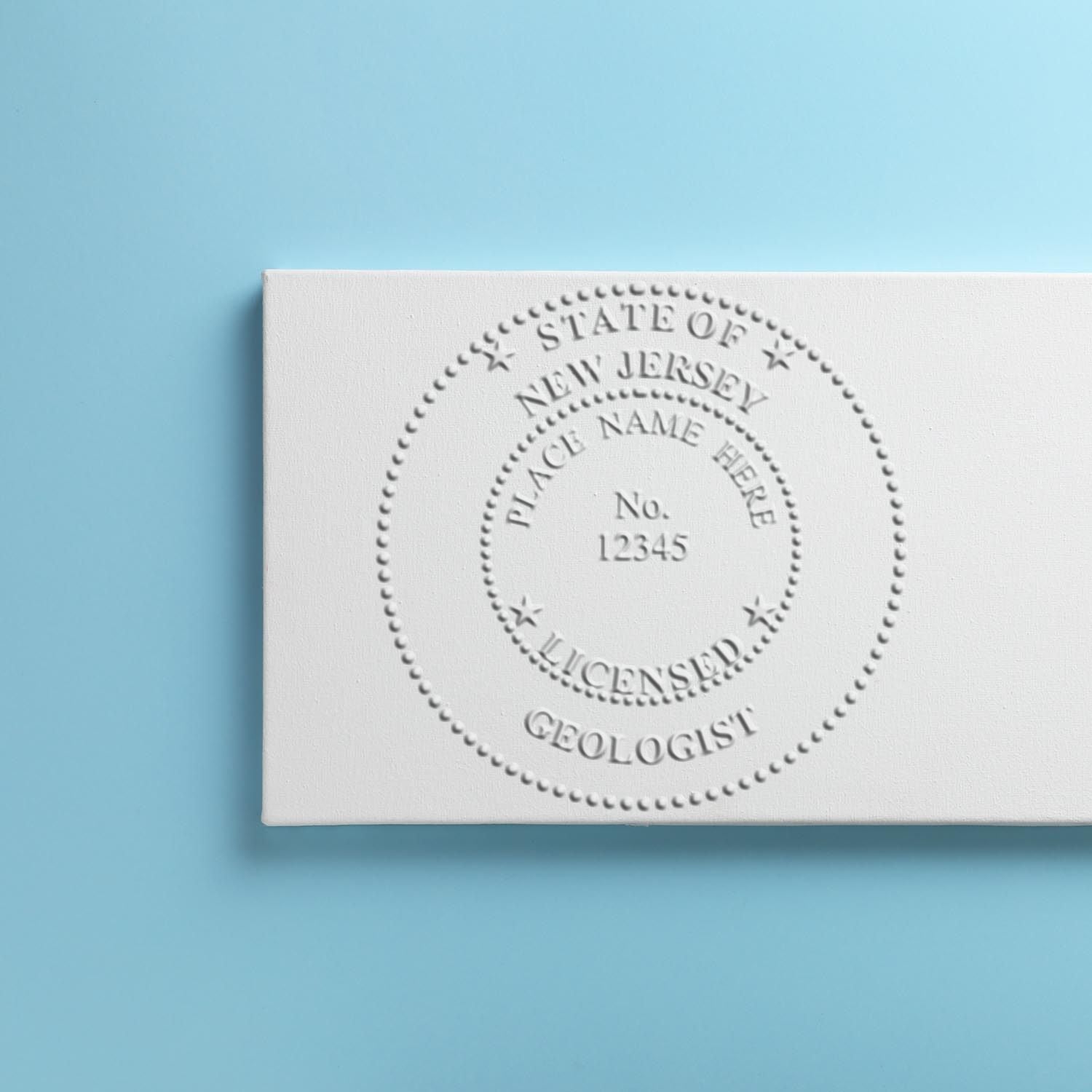 A stamped imprint of the Heavy Duty Cast Iron New Jersey Geologist Seal Embosser in this stylish lifestyle photo, setting the tone for a unique and personalized product.