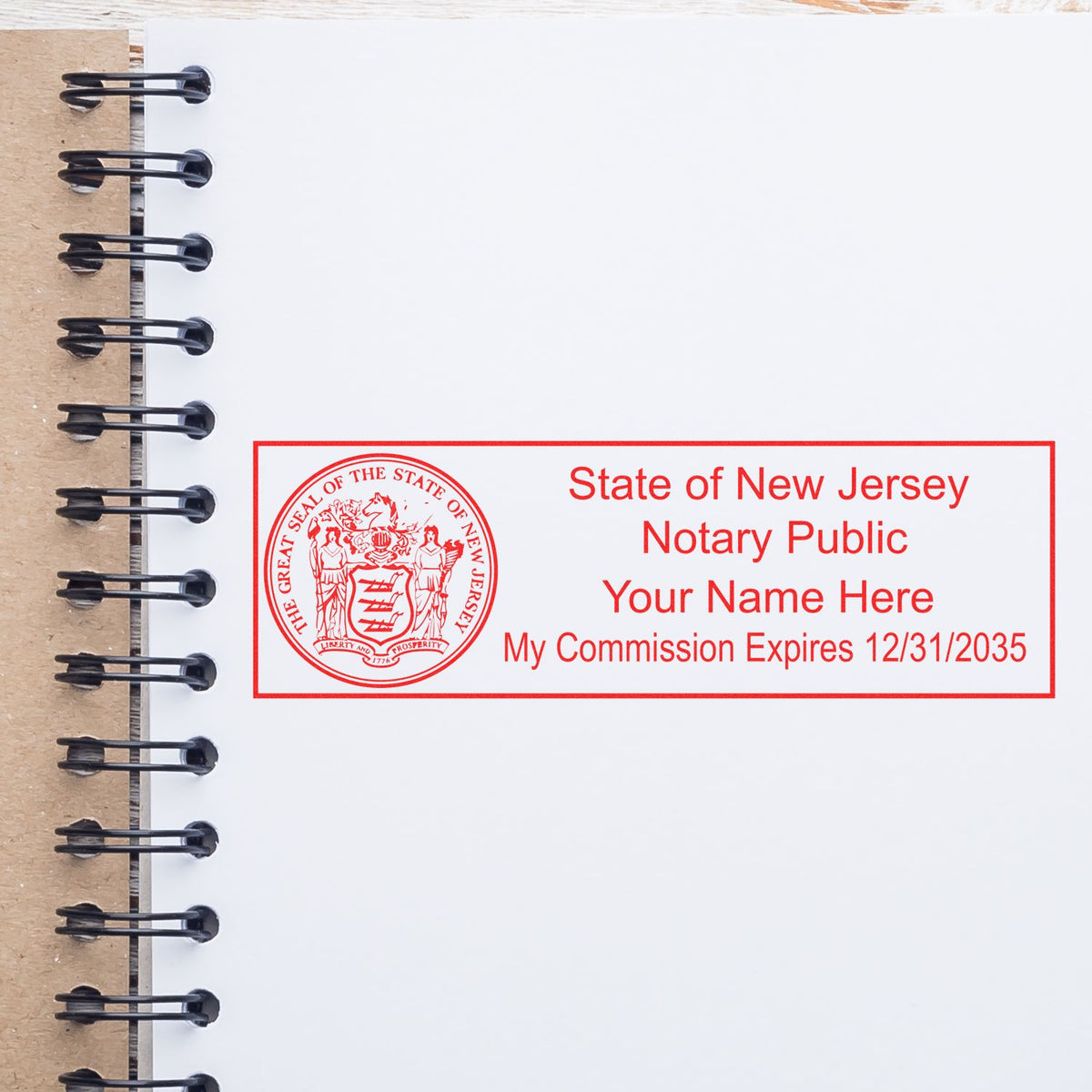 An alternative view of the Slim Pre-Inked State Seal Notary Stamp for New Jersey stamped on a sheet of paper showing the image in use