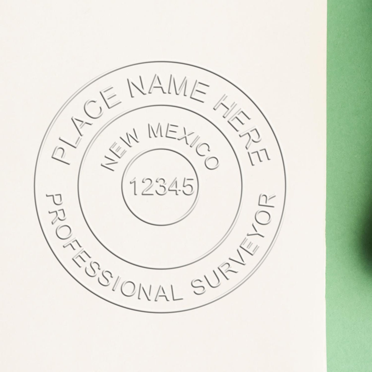 A lifestyle photo showing a stamped image of the State of New Mexico Soft Land Surveyor Embossing Seal on a piece of paper