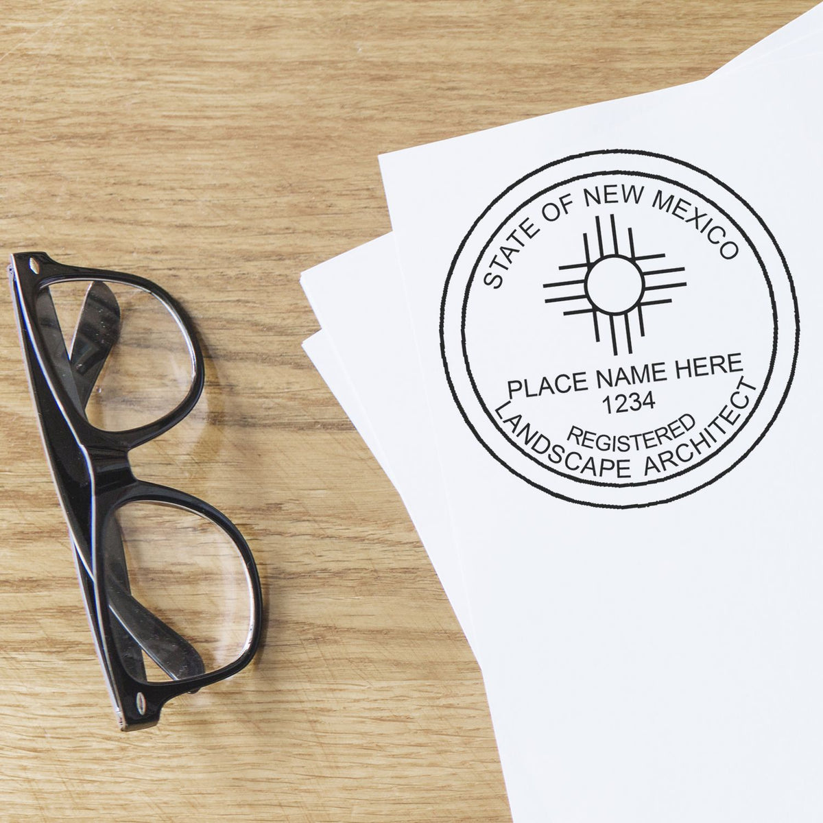 This paper is stamped with a sample imprint of the New Mexico Landscape Architectural Seal Stamp, signifying its quality and reliability.