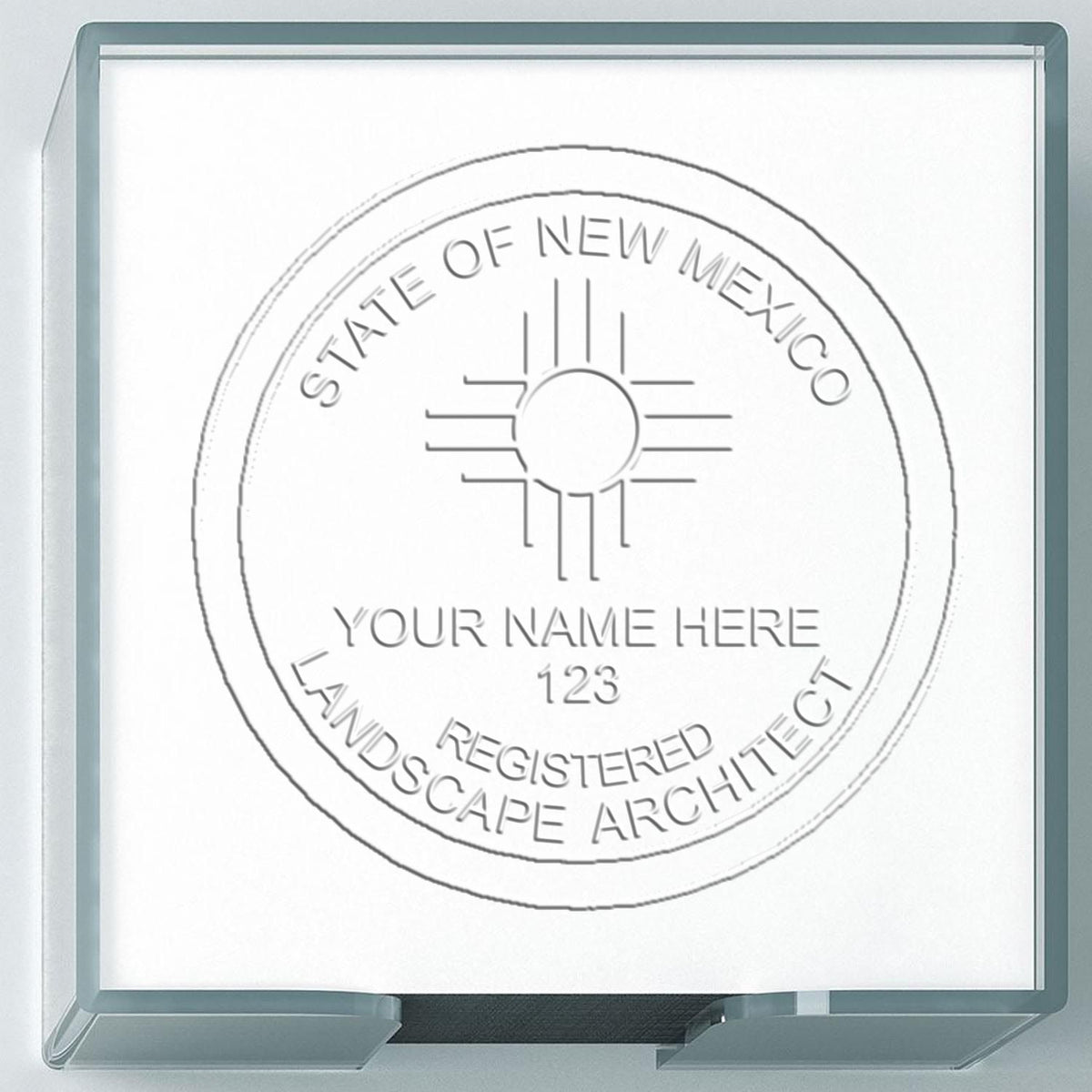 A photograph of the Hybrid New Mexico Landscape Architect Seal stamp impression reveals a vivid, professional image of the on paper.