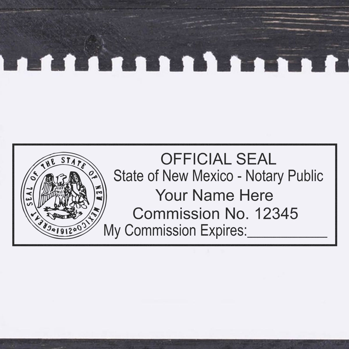 A lifestyle photo showing a stamped image of the Heavy-Duty New Mexico Rectangular Notary Stamp on a piece of paper