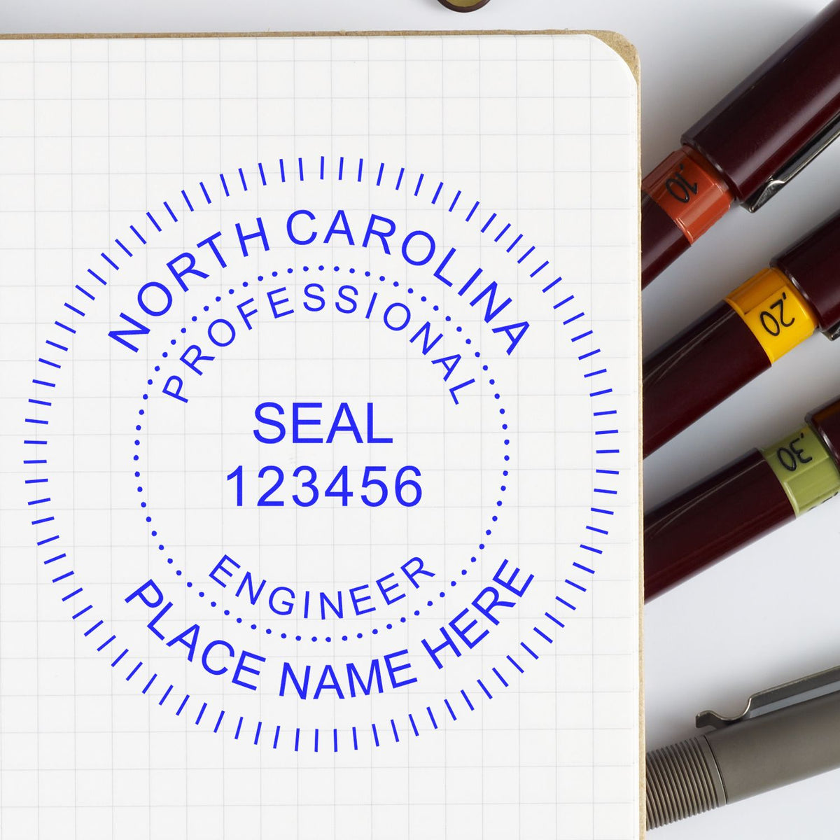 The Slim Pre-Inked North Carolina Professional Engineer Seal Stamp stamp impression comes to life with a crisp, detailed photo on paper - showcasing true professional quality.