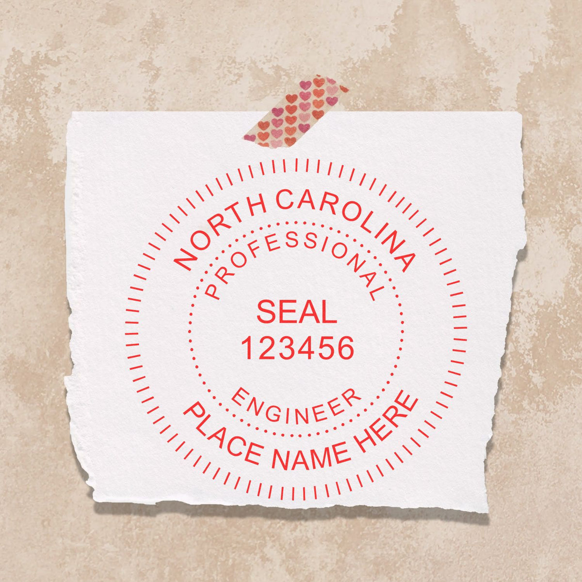 An alternative view of the Slim Pre-Inked North Carolina Professional Engineer Seal Stamp stamped on a sheet of paper showing the image in use