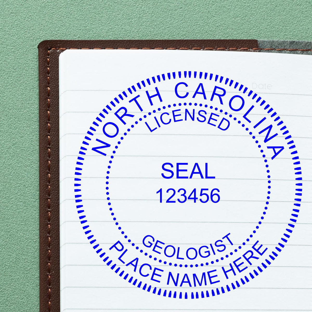 The Slim Pre-Inked North Carolina Professional Geologist Seal Stamp stamp impression comes to life with a crisp, detailed image stamped on paper - showcasing true professional quality.