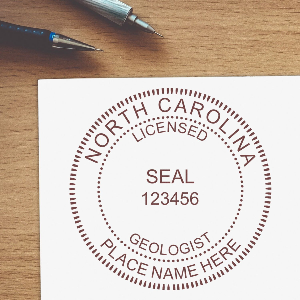 The Self-Inking North Carolina Geologist Stamp stamp impression comes to life with a crisp, detailed image stamped on paper - showcasing true professional quality.