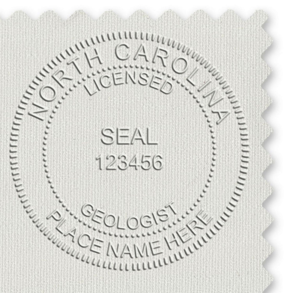 An in use photo of the Soft North Carolina Professional Geologist Seal showing a sample imprint on a cardstock