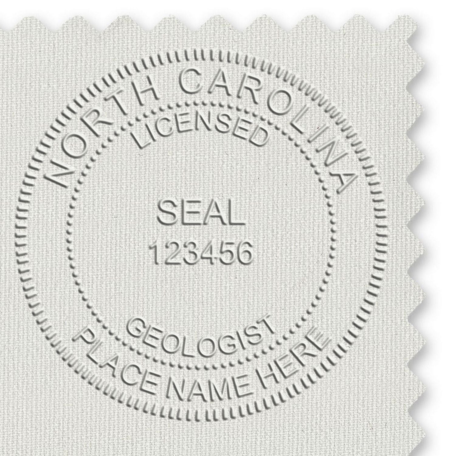 The main image for the Heavy Duty Cast Iron North Carolina Geologist Seal Embosser depicting a sample of the imprint and imprint sample