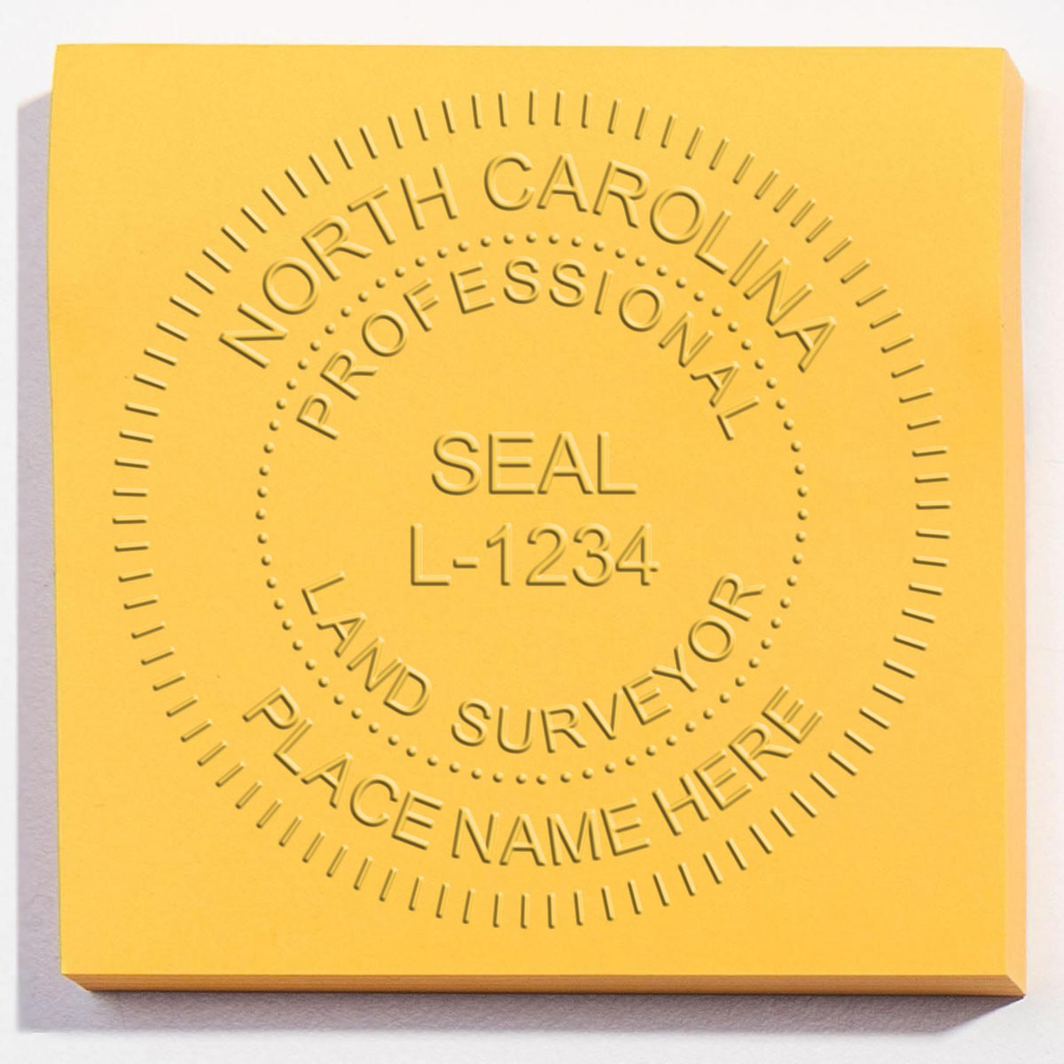 A photograph of the Hybrid North Carolina Land Surveyor Seal stamp impression reveals a vivid, professional image of the on paper.