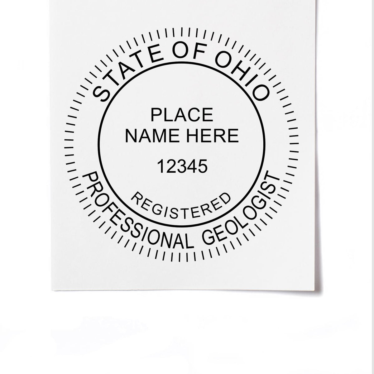 A lifestyle photo showing a stamped image of the Self-Inking Ohio Geologist Stamp on a piece of paper