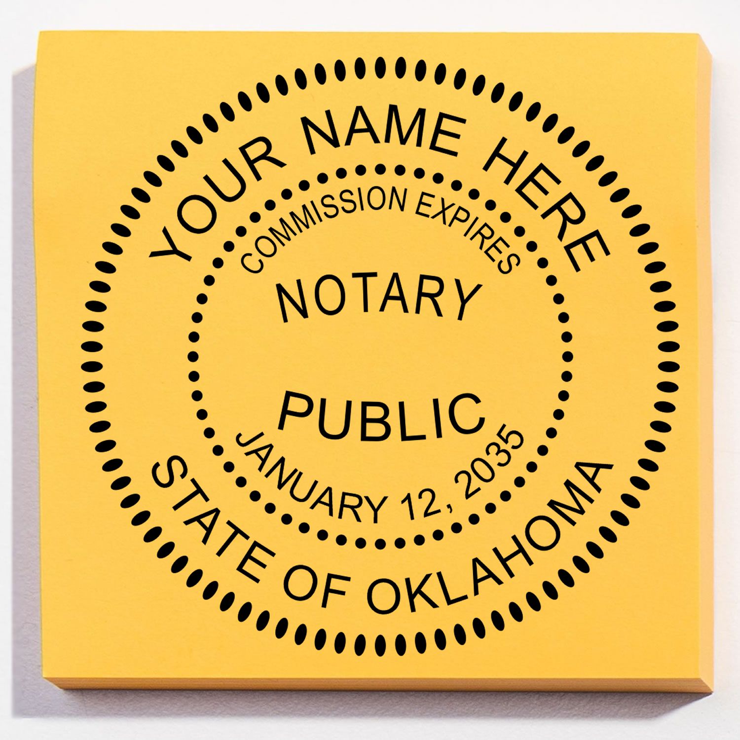An alternative view of the Slim Pre-Inked Round Notary Stamp for Oklahoma stamped on a sheet of paper showing the image in use