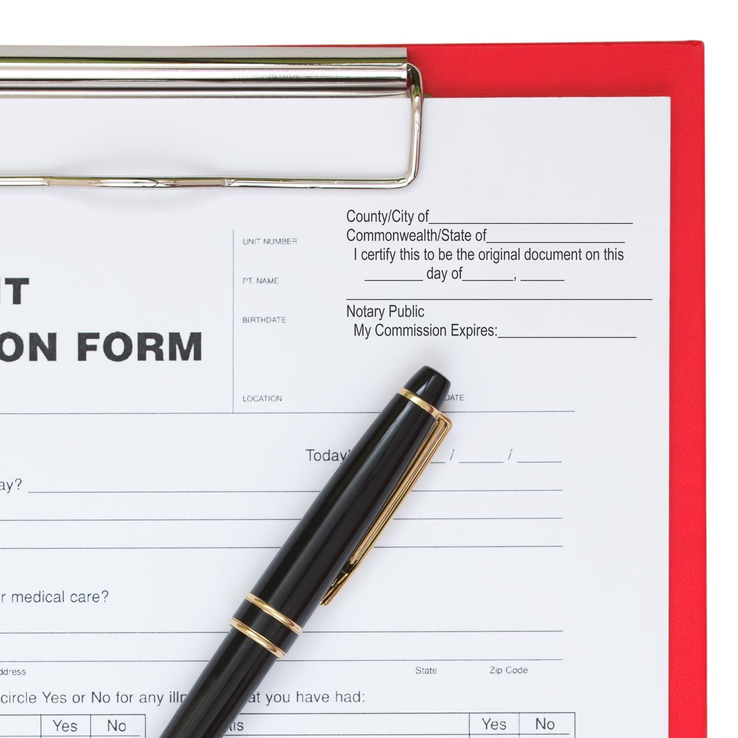 A Regular Notary Original Document Stamp is used on a form, with a black pen placed on top of the document on a red clipboard.