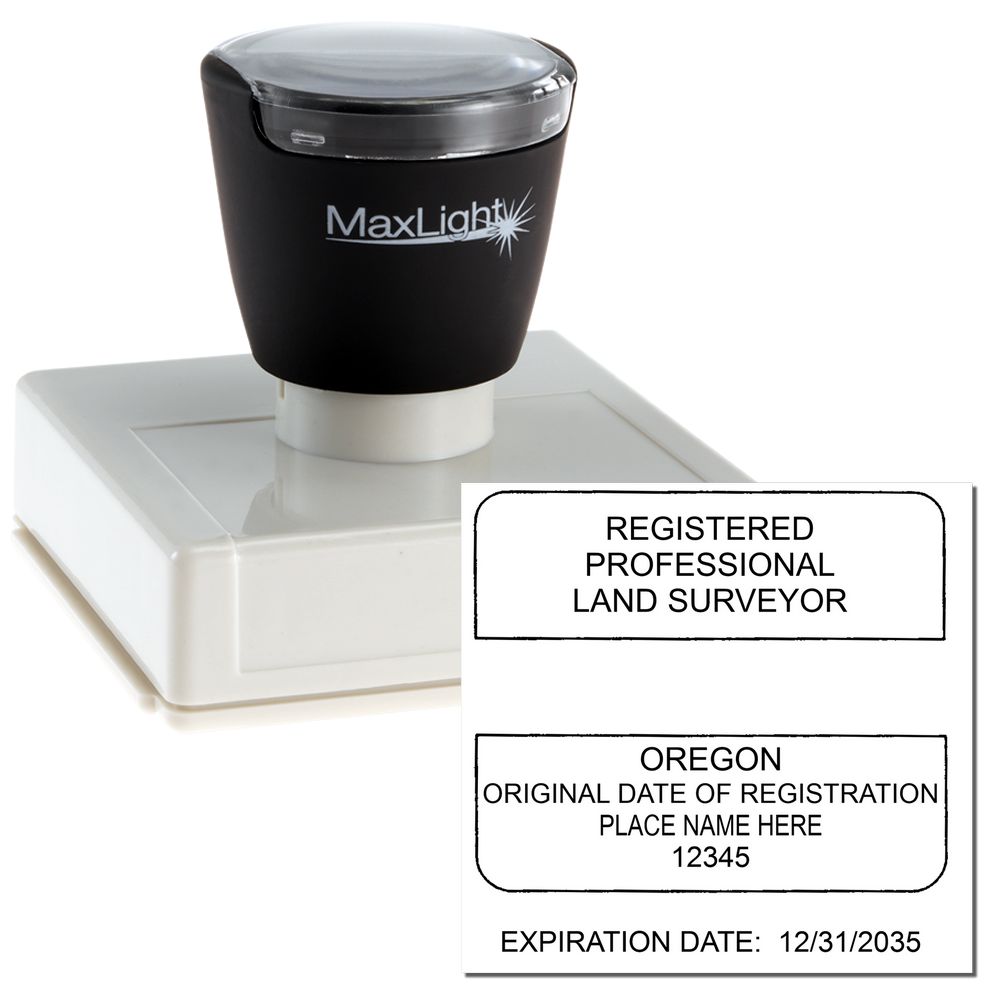 Premium MaxLight Pre-Inked Oregon Surveyors Stamp with a black handle and white base, showing a sample imprint for registered professional land surveyors.