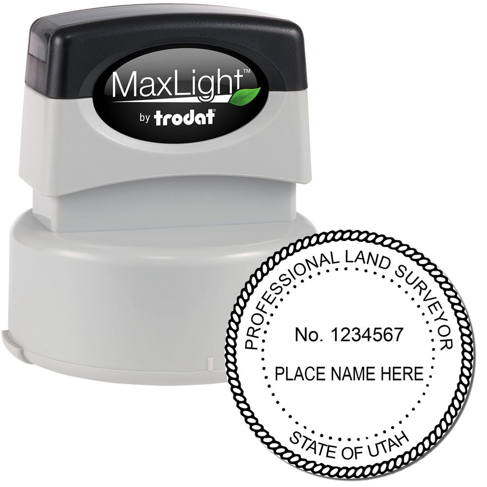 Premium MaxLight Pre-Inked Utah Surveyors Stamp with black and gray casing, featuring a circular imprint for professional land surveyors in Utah.