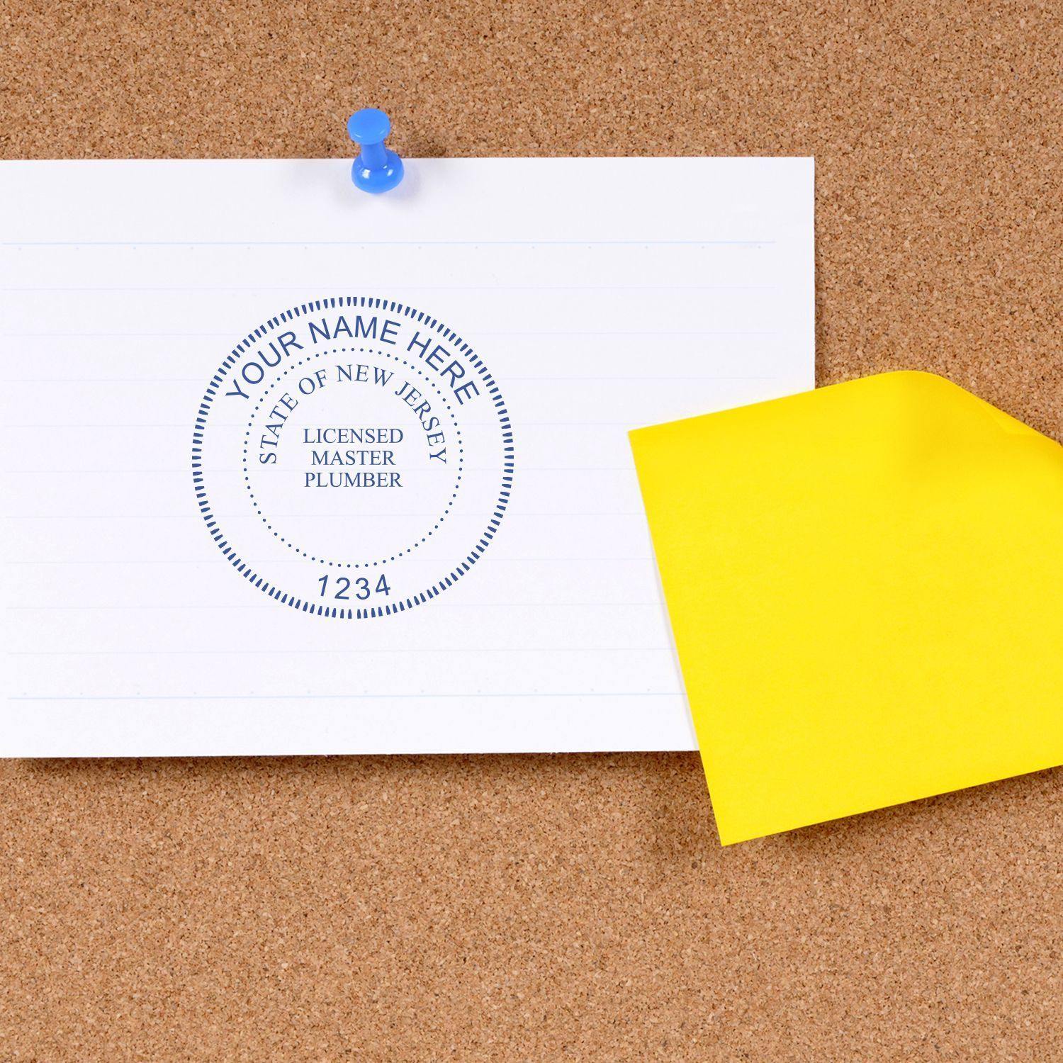 A Professional Slim Pre-Inked Rubber Stamp of Seal imprint on a white paper pinned to a corkboard, with a yellow sticky note beside it.