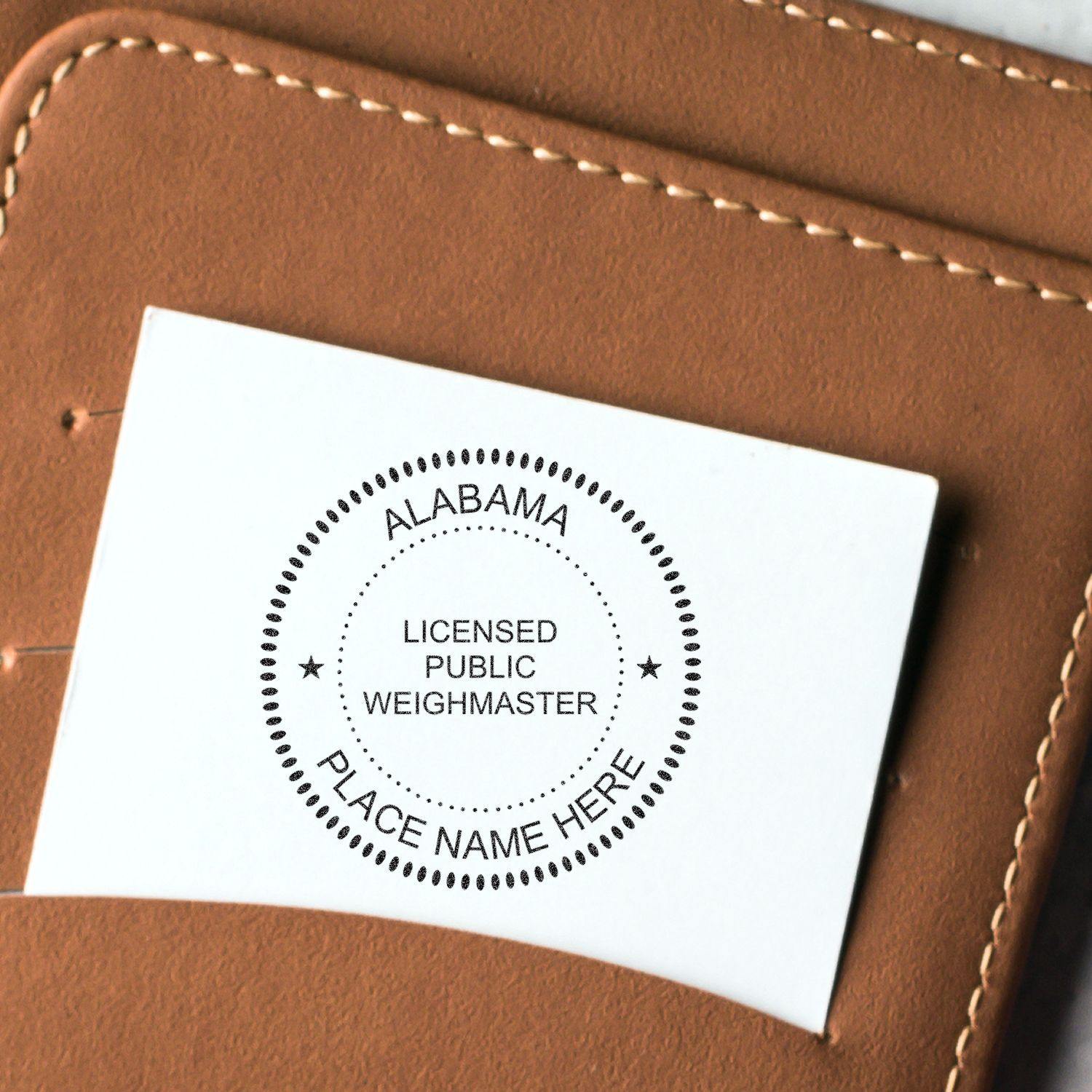 Public Weighmaster Slim Pre-Inked Rubber Stamp of Seal on a white card, placed on a brown leather surface.