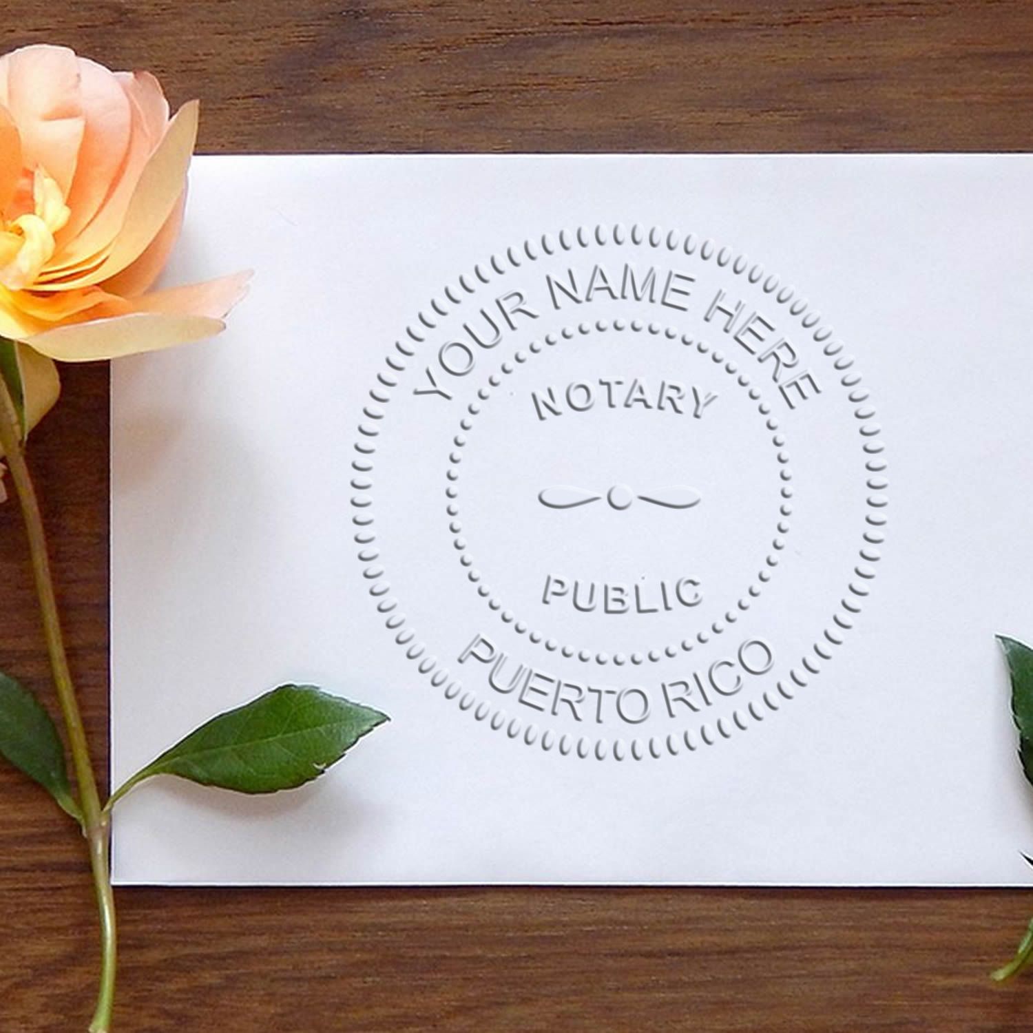 A stamped impression of the Pink Hybrid Puerto Rico Notary Embosser in this stylish lifestyle photo, setting the tone for a unique and personalized product.