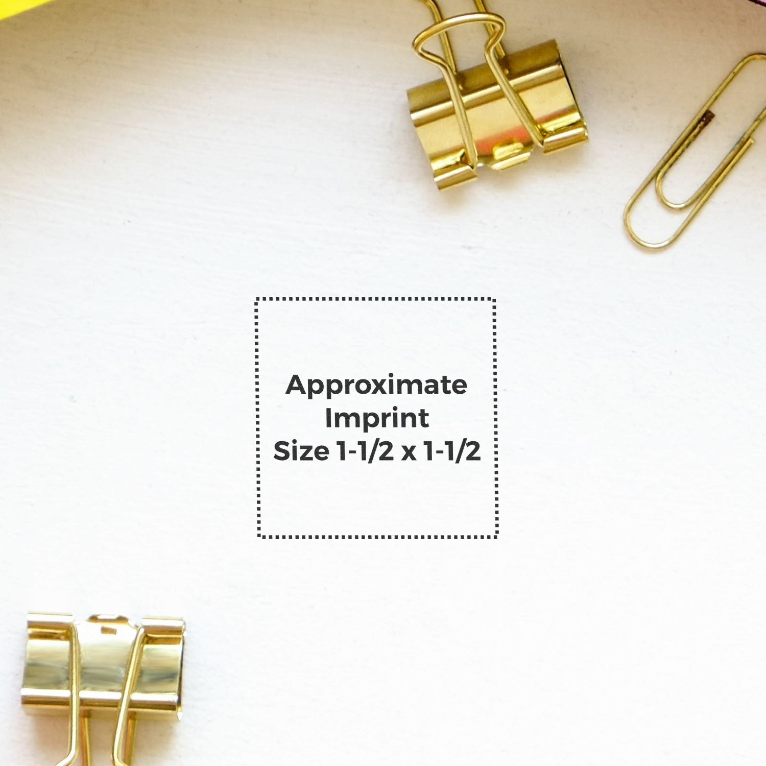 Custom Rubber Stamp Size 1-1/2 x 1-1/2 imprint area shown on white paper with gold binder clips and a paperclip around it.