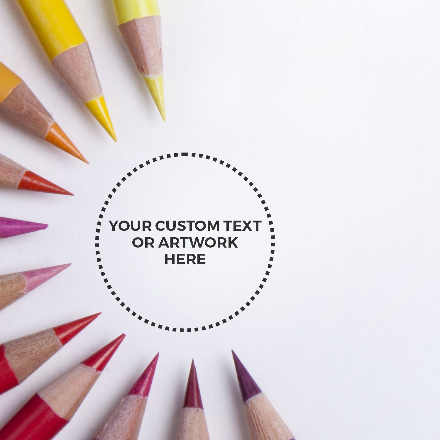 Colored pencils encircle a stamped circle with YOUR CUSTOM TEXT OR ARTWORK HERE in the center, showcasing the Custom Rubber Stamp Size 1 Inch Diameter.