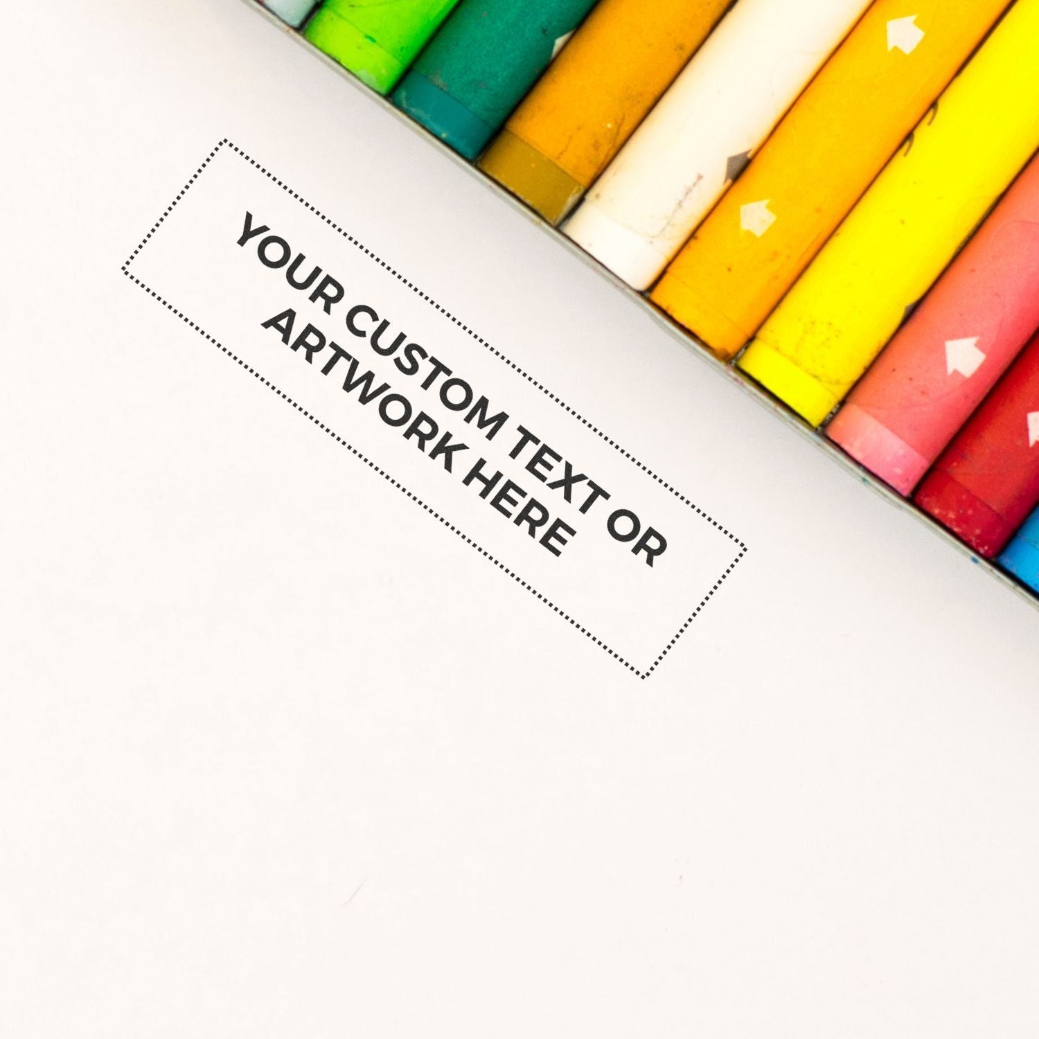 Custom Rubber Stamp Size 1 x 4 with Your Custom Text or Artwork Here next to colorful crayons on a white background.