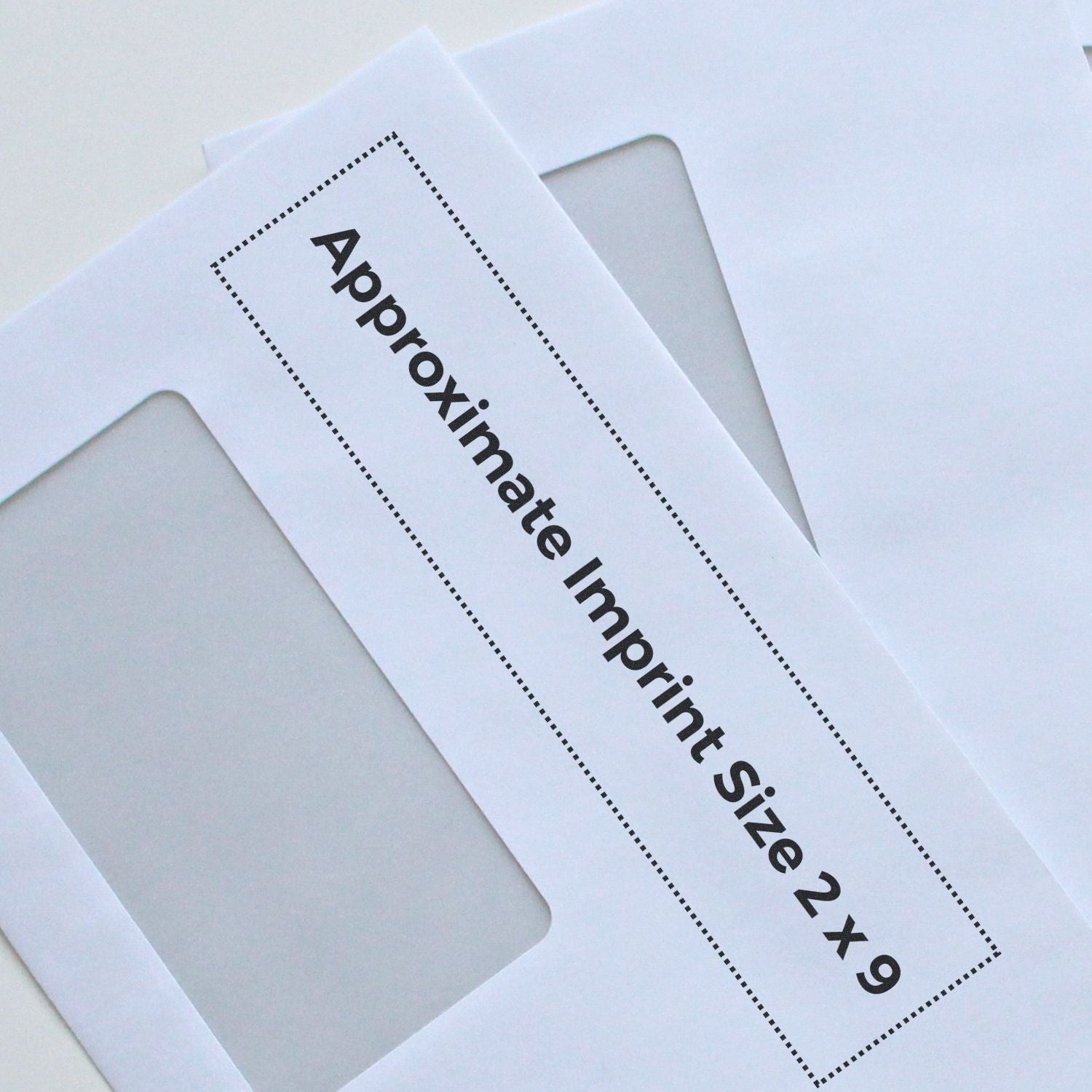 Custom Rubber Stamp Size 2 x 9 shown on white paper with approximate imprint size dimensions overlay.