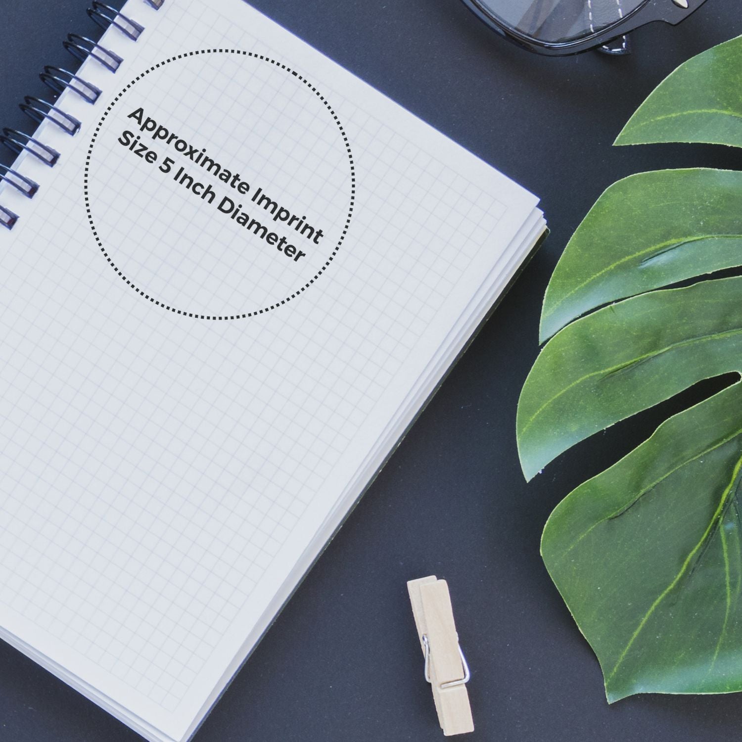A notebook with a dotted circle labeled Approximate Imprint Size 5 Inch Diameter for the Custom Rubber Stamp Size 5 Inch Diameter.