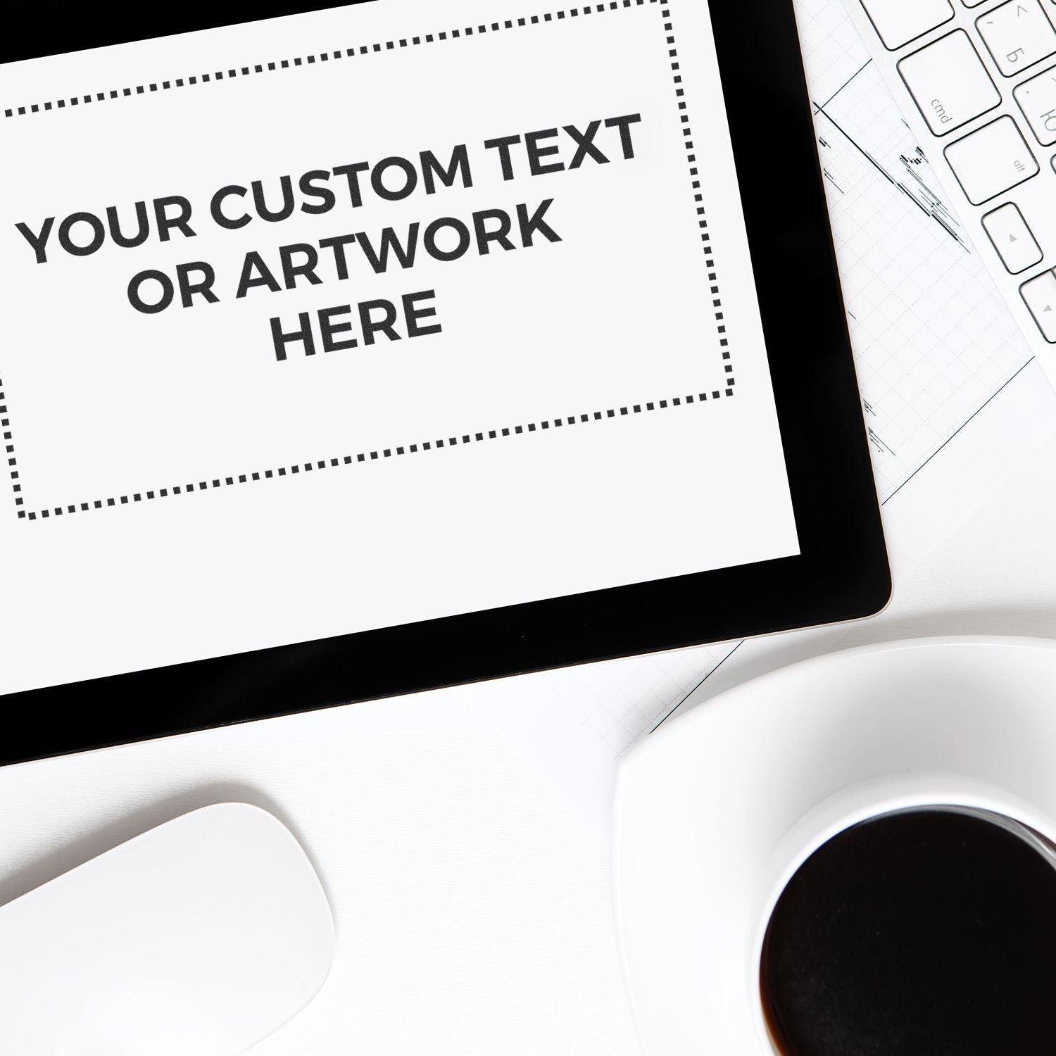 Custom Rubber Stamp Size 5 x 9 example on a tablet screen with text YOUR CUSTOM TEXT OR ARTWORK HERE next to a keyboard and coffee cup.