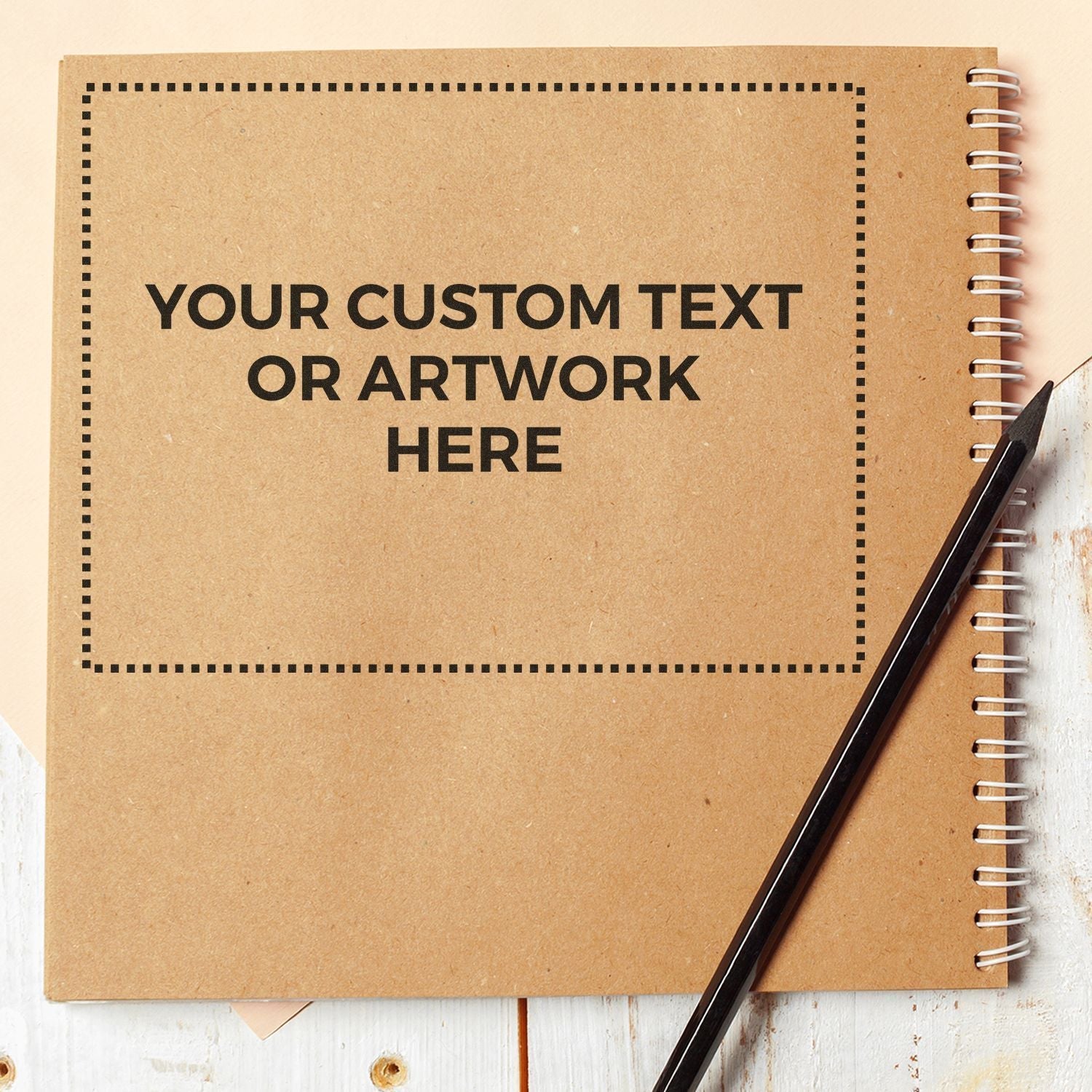 Custom Rubber Stamp Size 6 x 8 used on a brown spiral notebook with a pencil beside it.