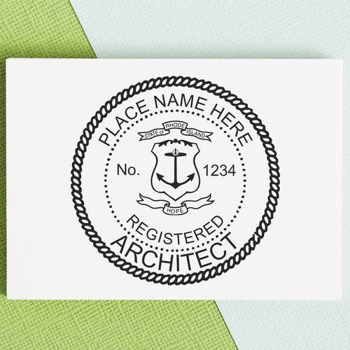 Premium MaxLight Pre-Inked Rhode Island Architectural Stamp on a white card with green and blue background.