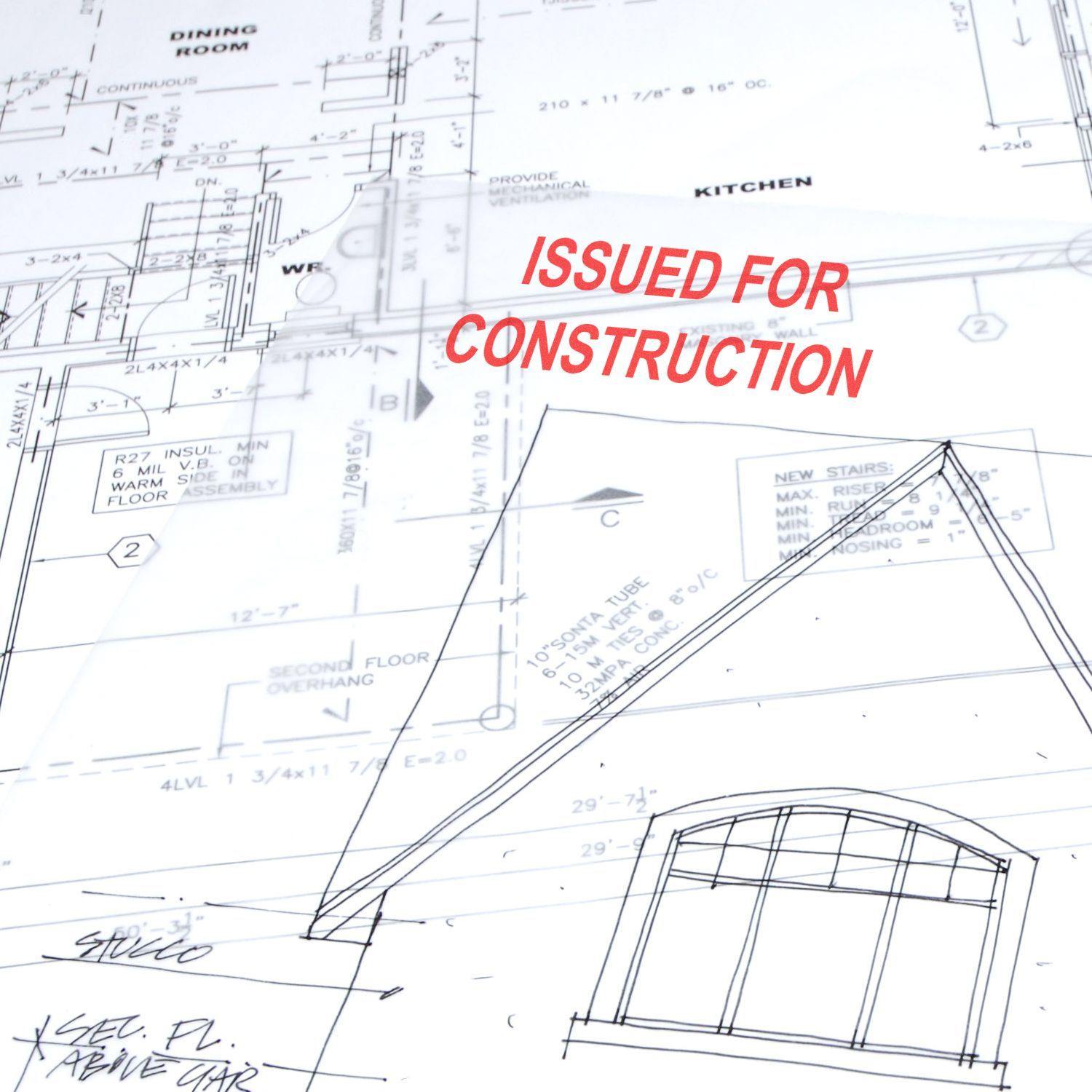 Blueprint with ISSUED FOR CONSTRUCTION stamped in red using a Self Inking Issued for Construction Stamp.