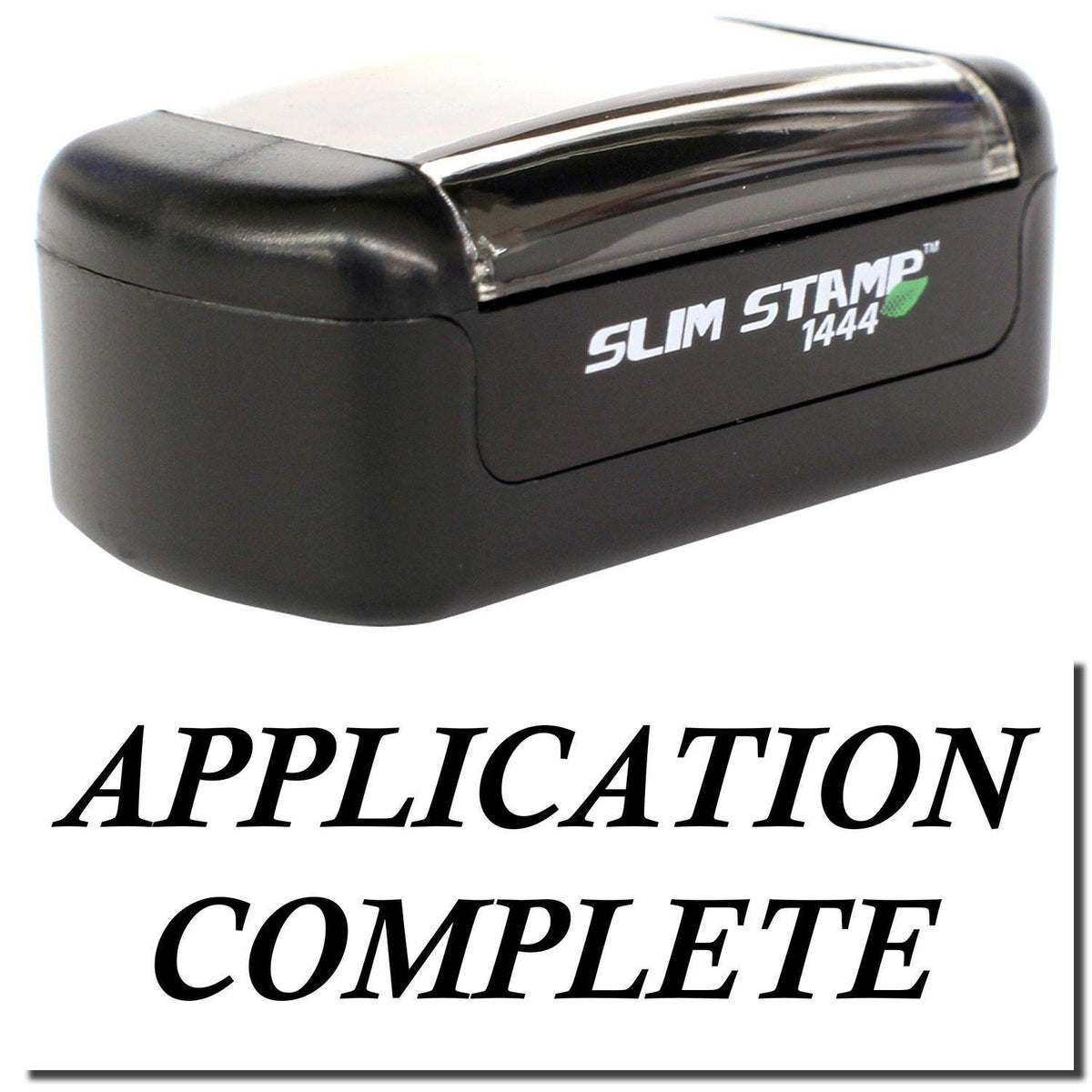 A stock office pre-inked stamp with a stamped image showing how the text &quot;APPLICATION COMPLETE&quot; is displayed after stamping.