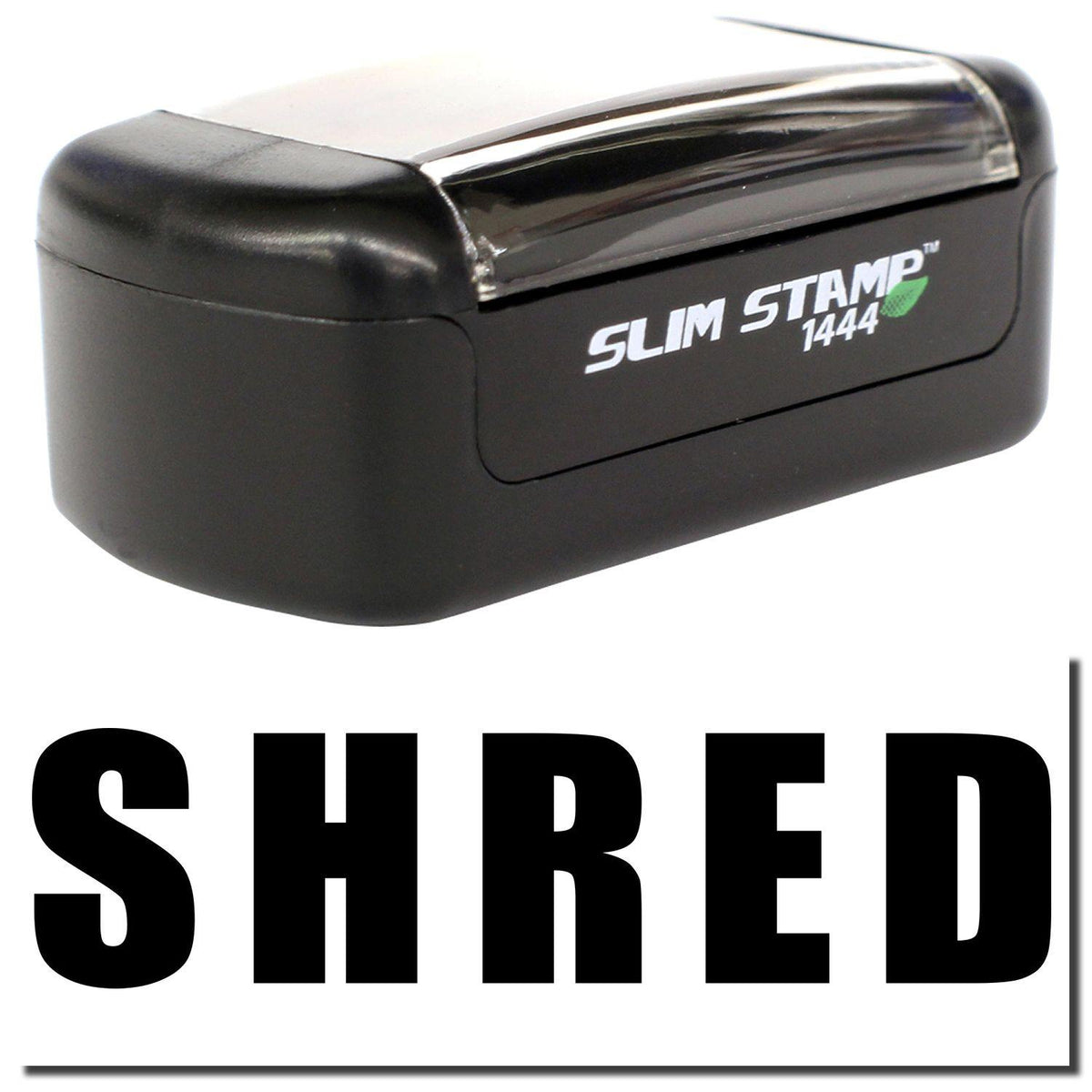 A stock office pre-inked stamp with a stamped image showing how the text &quot;SHRED&quot; in bold font is displayed after stamping.