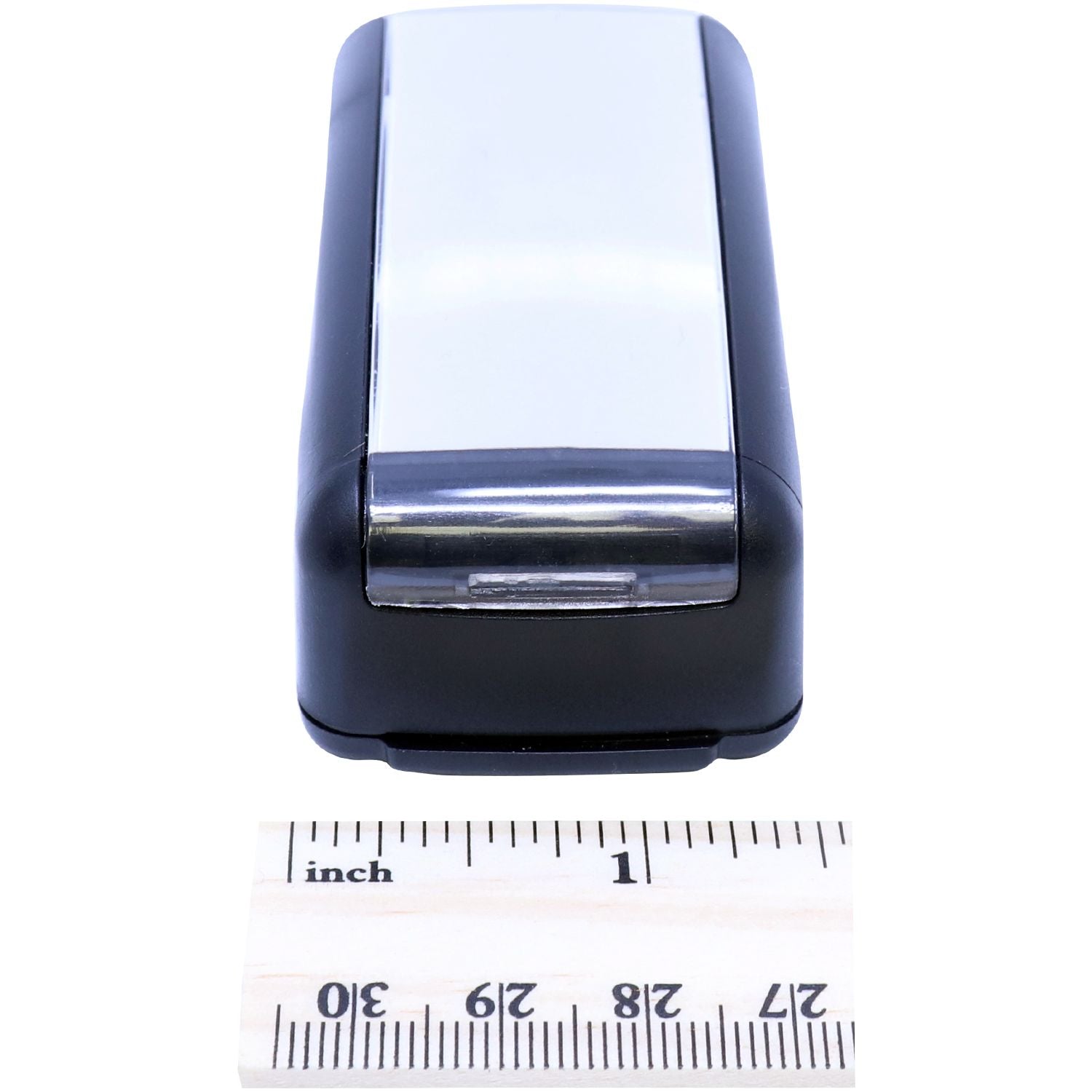 Slim Pre-Inked Notary Acknowledgment Stamp shown next to a ruler for size reference. The stamp is compact and rectangular in shape.
