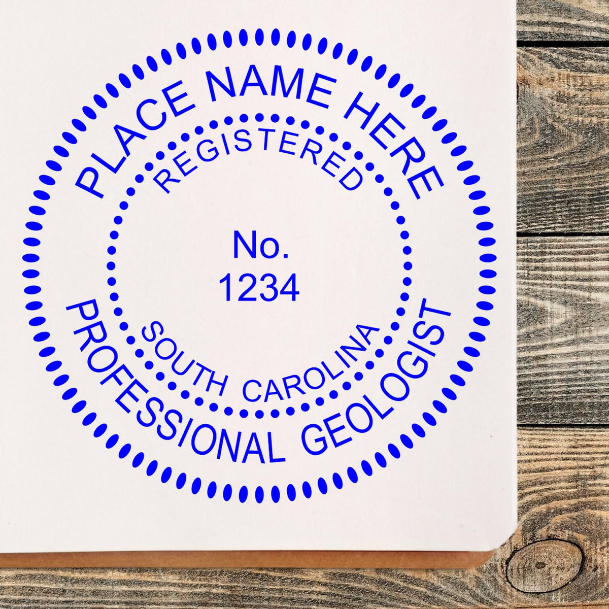 A stamped imprint of the South Carolina Professional Geologist Seal Stamp in this stylish lifestyle photo, setting the tone for a unique and personalized product.