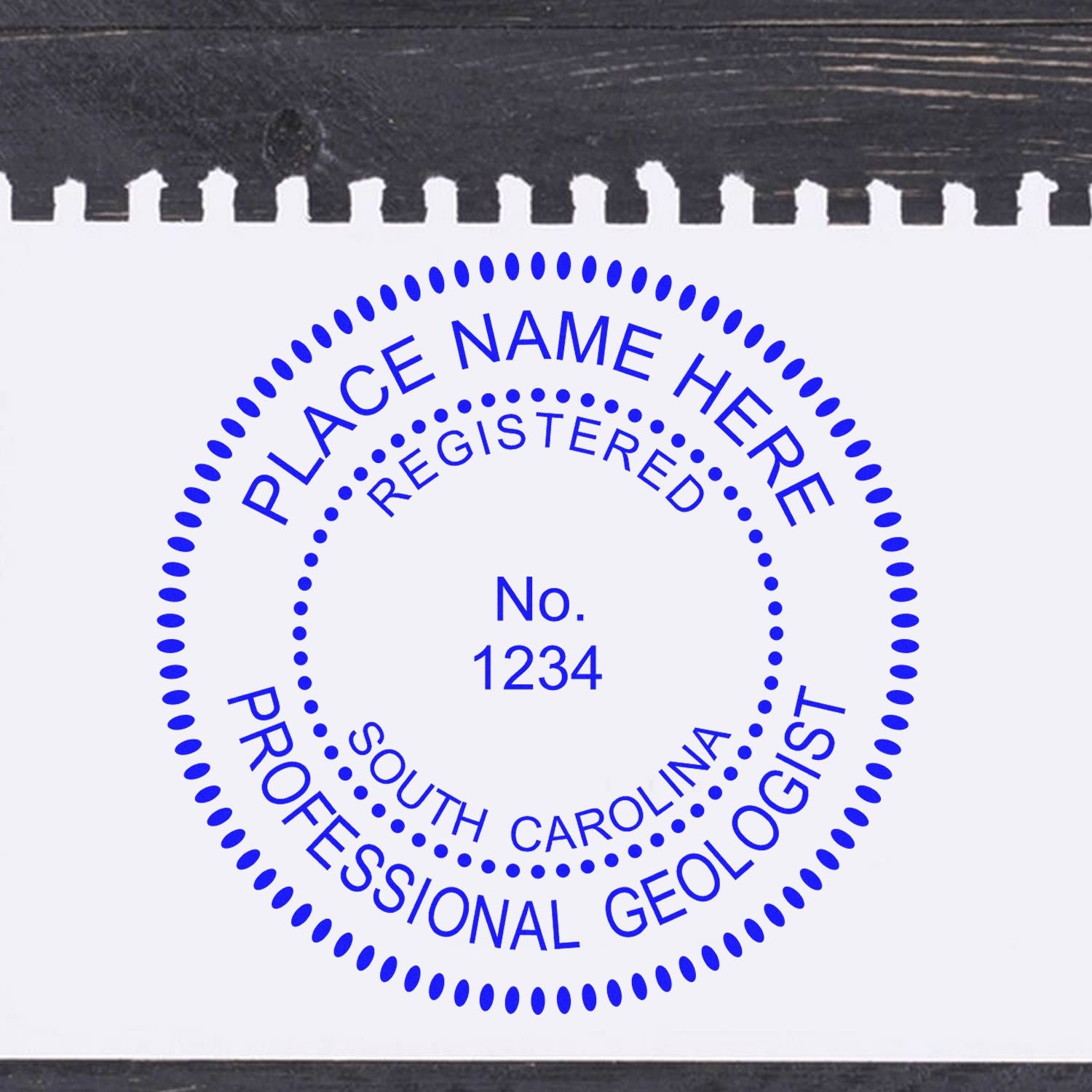 An alternative view of the Self-Inking South Carolina Geologist Stamp stamped on a sheet of paper showing the image in use