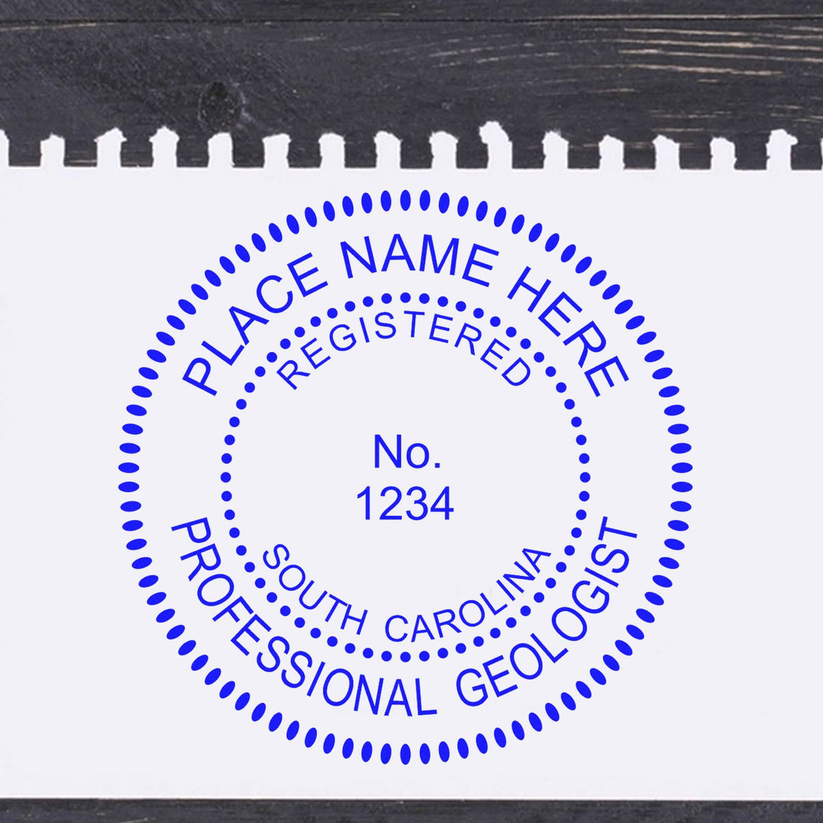 An alternative view of the Self-Inking South Carolina Geologist Stamp stamped on a sheet of paper showing the image in use