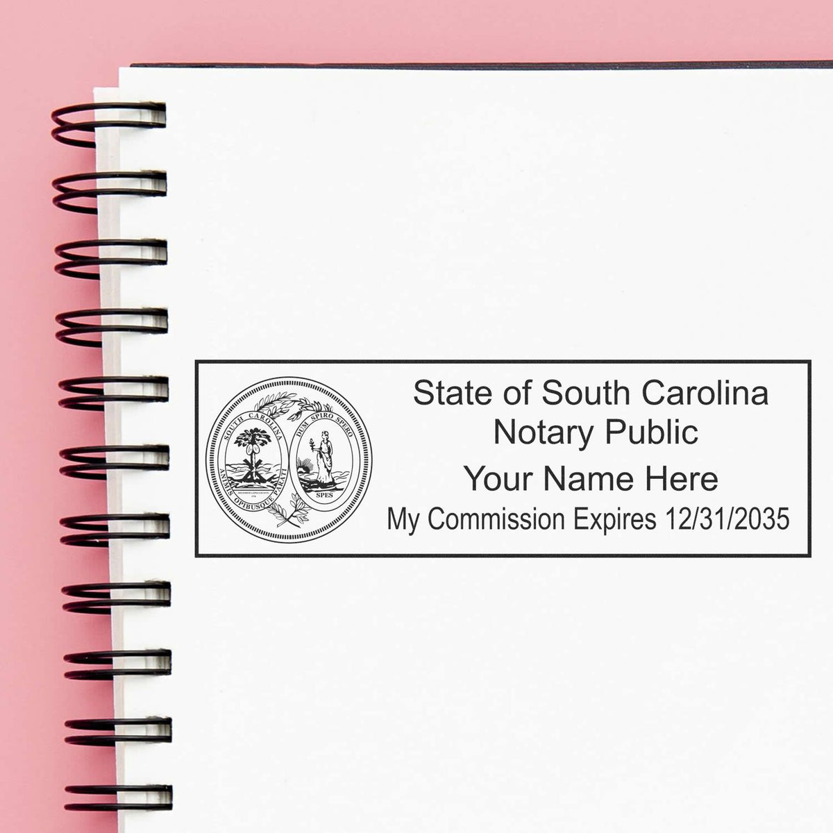 A lifestyle photo showing a stamped image of the Heavy-Duty South Carolina Rectangular Notary Stamp on a piece of paper