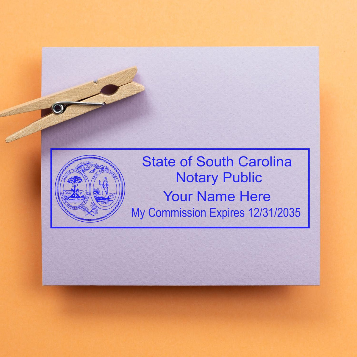 An alternative view of the Heavy-Duty South Carolina Rectangular Notary Stamp stamped on a sheet of paper showing the image in use