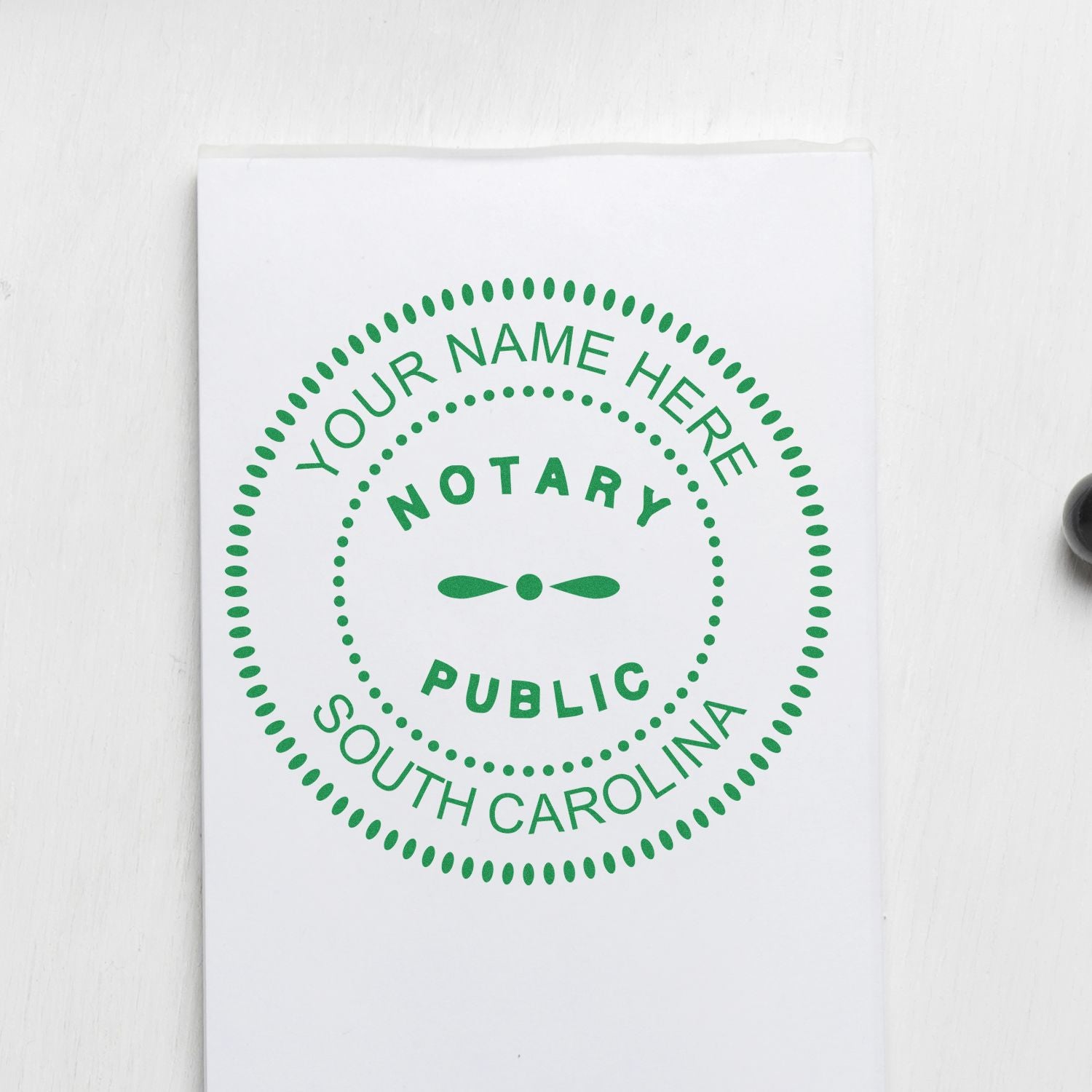 A photograph of the Round South Carolina Notary Public Seal Stamp stamp impression reveals a vivid, professional image of the on paper.